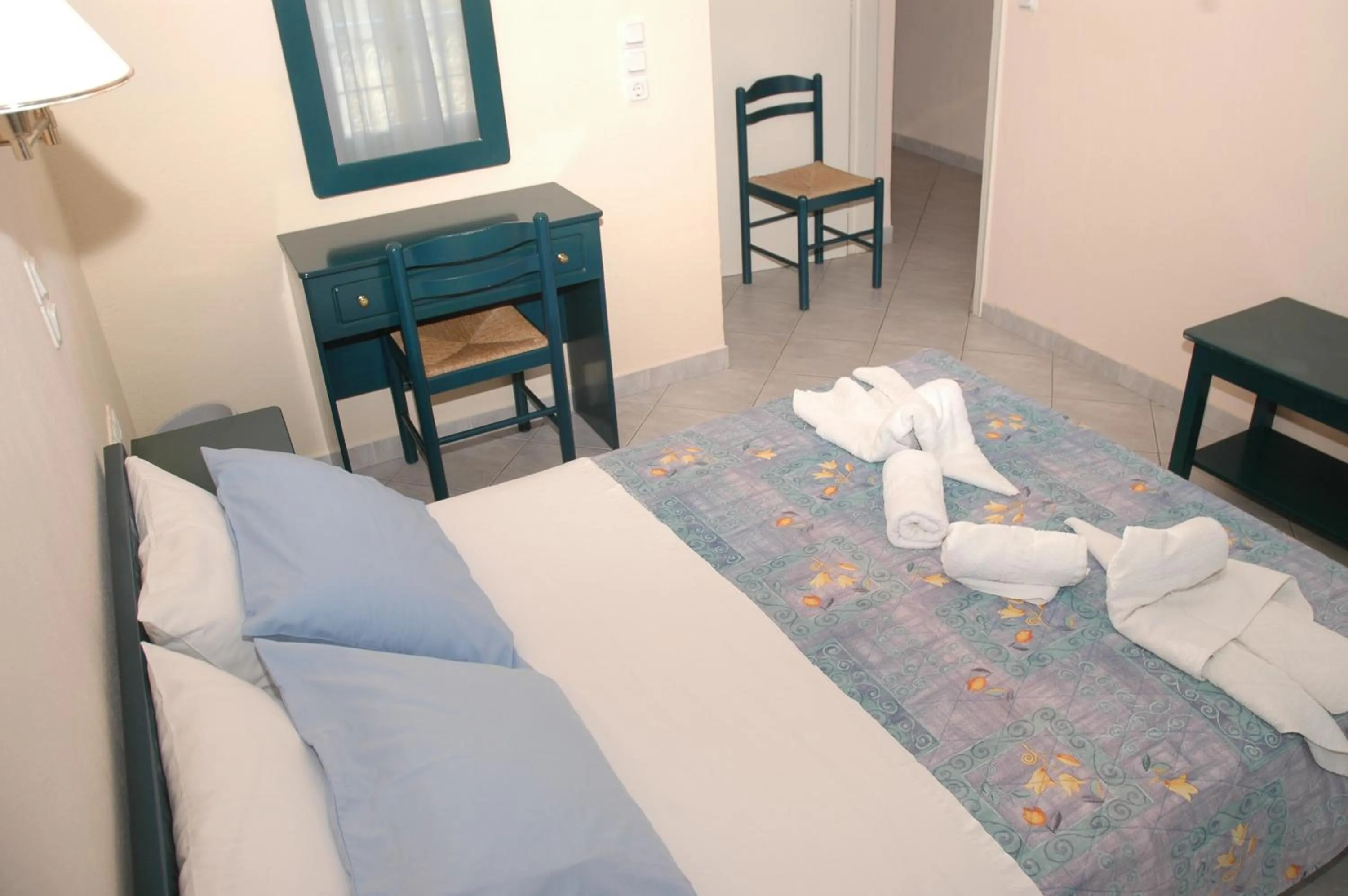 Bed in Agnanti Hotel