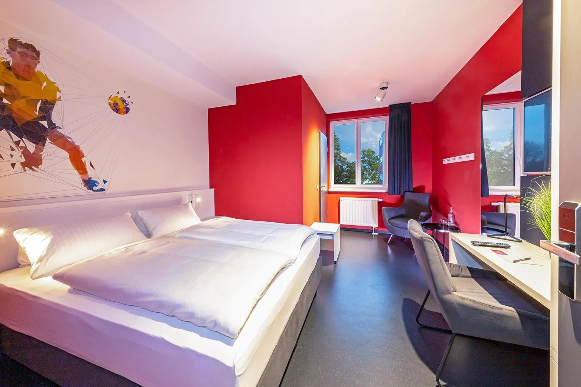 Photo of the whole room, Bed in Hotel Athletik Kiel