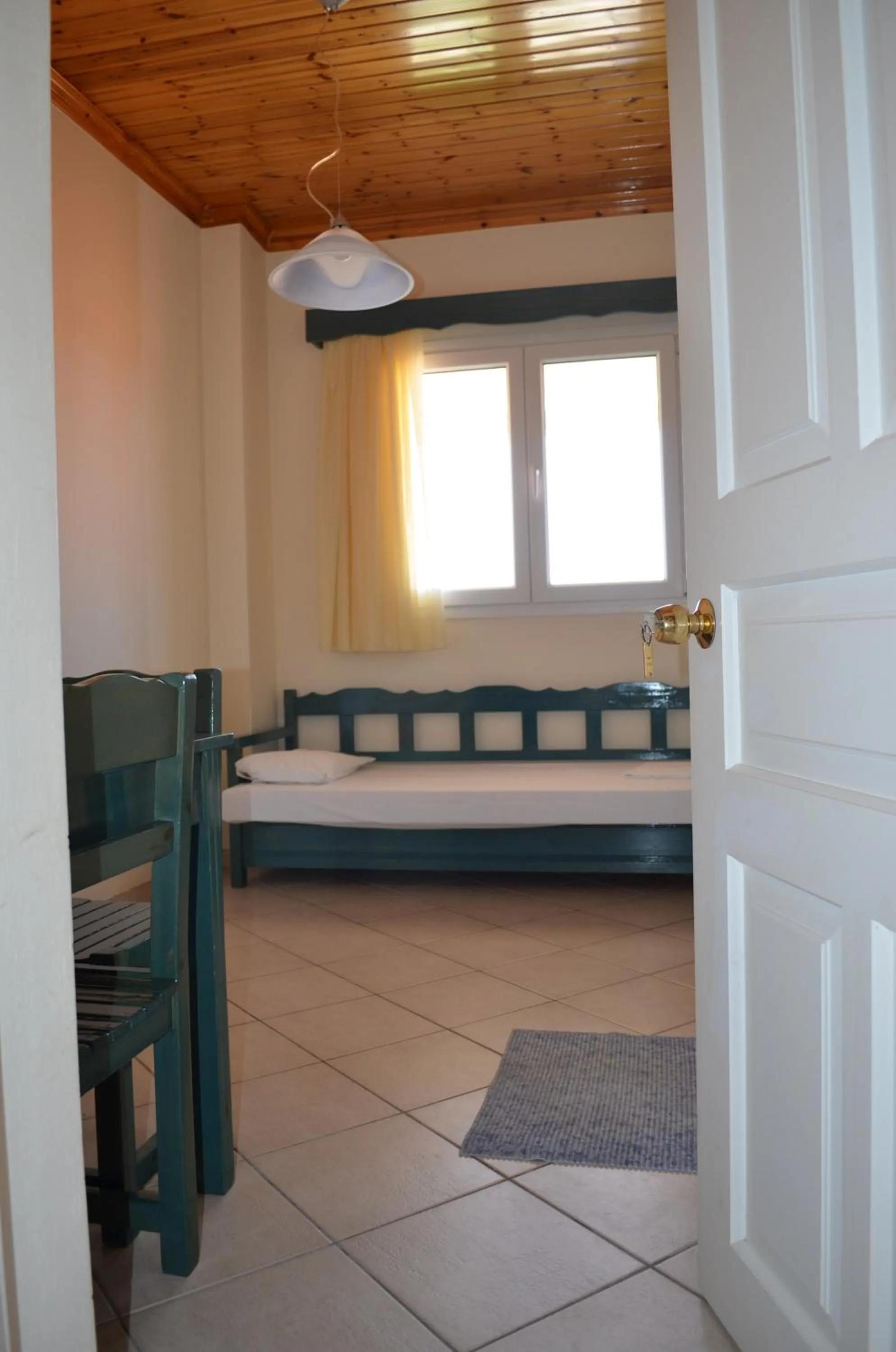 Bed in Odysseia Apartments