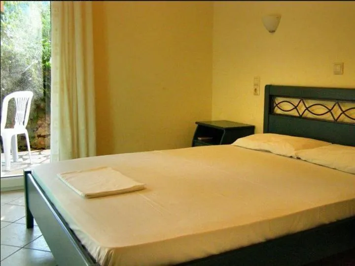 Bed in Odysseia Apartments