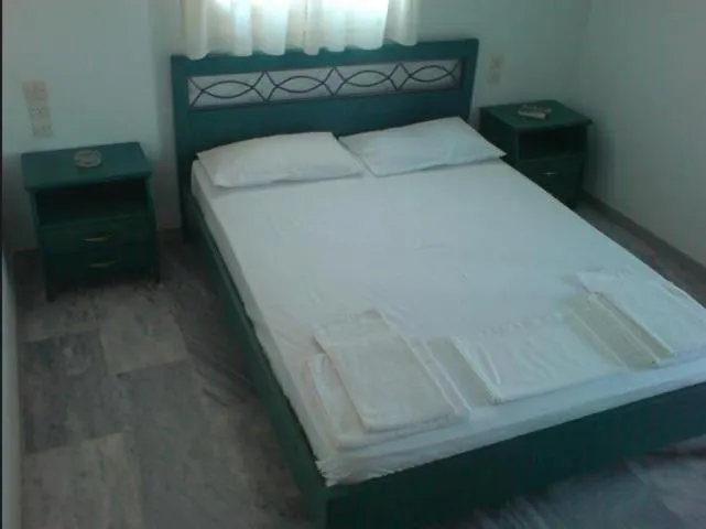 Bed in Odysseia Apartments