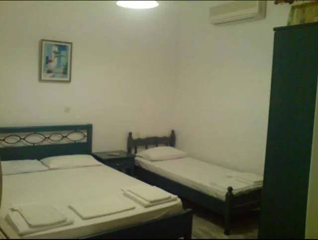 Bed in Odysseia Apartments