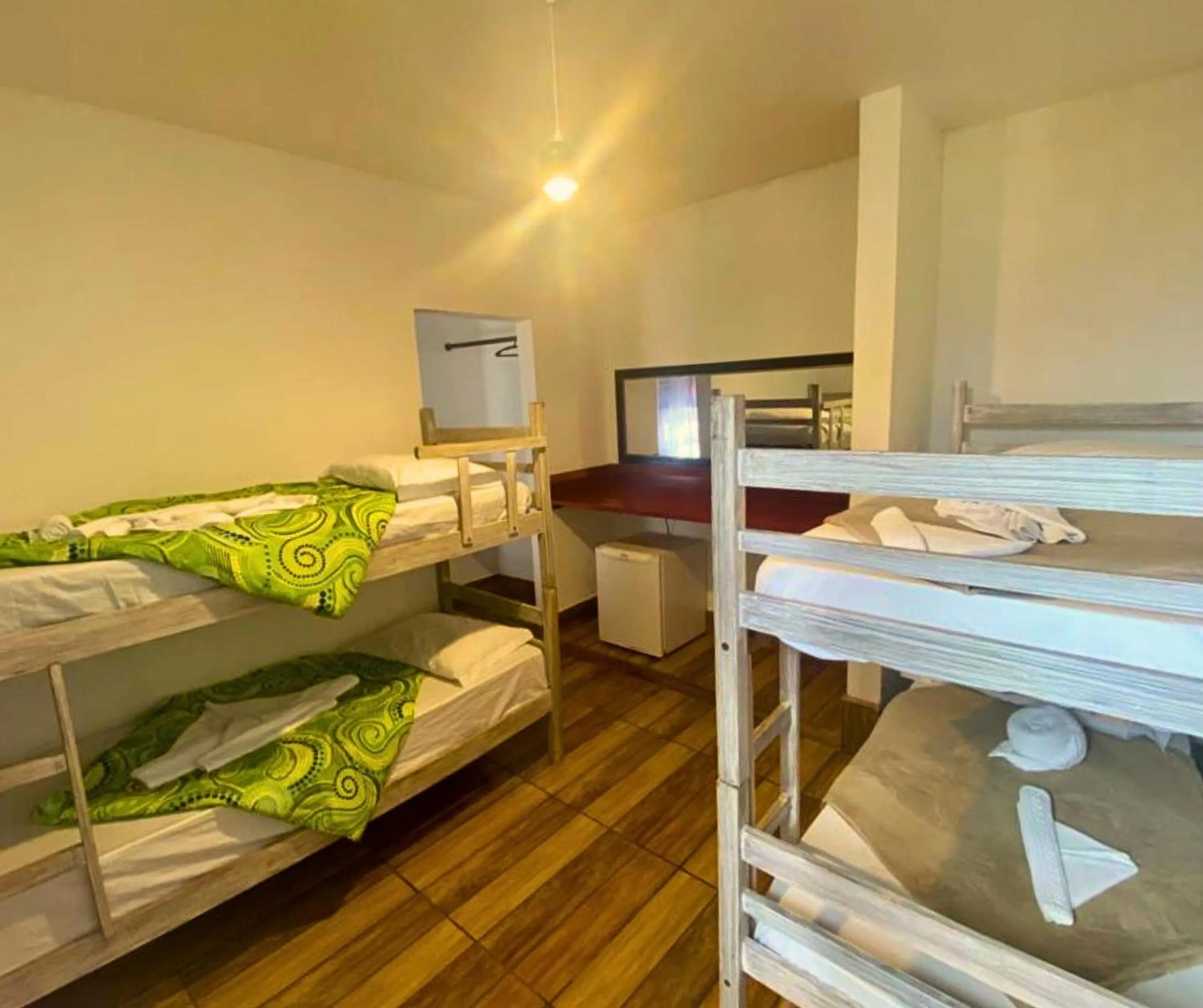 Bed in Pousada Papaya Container