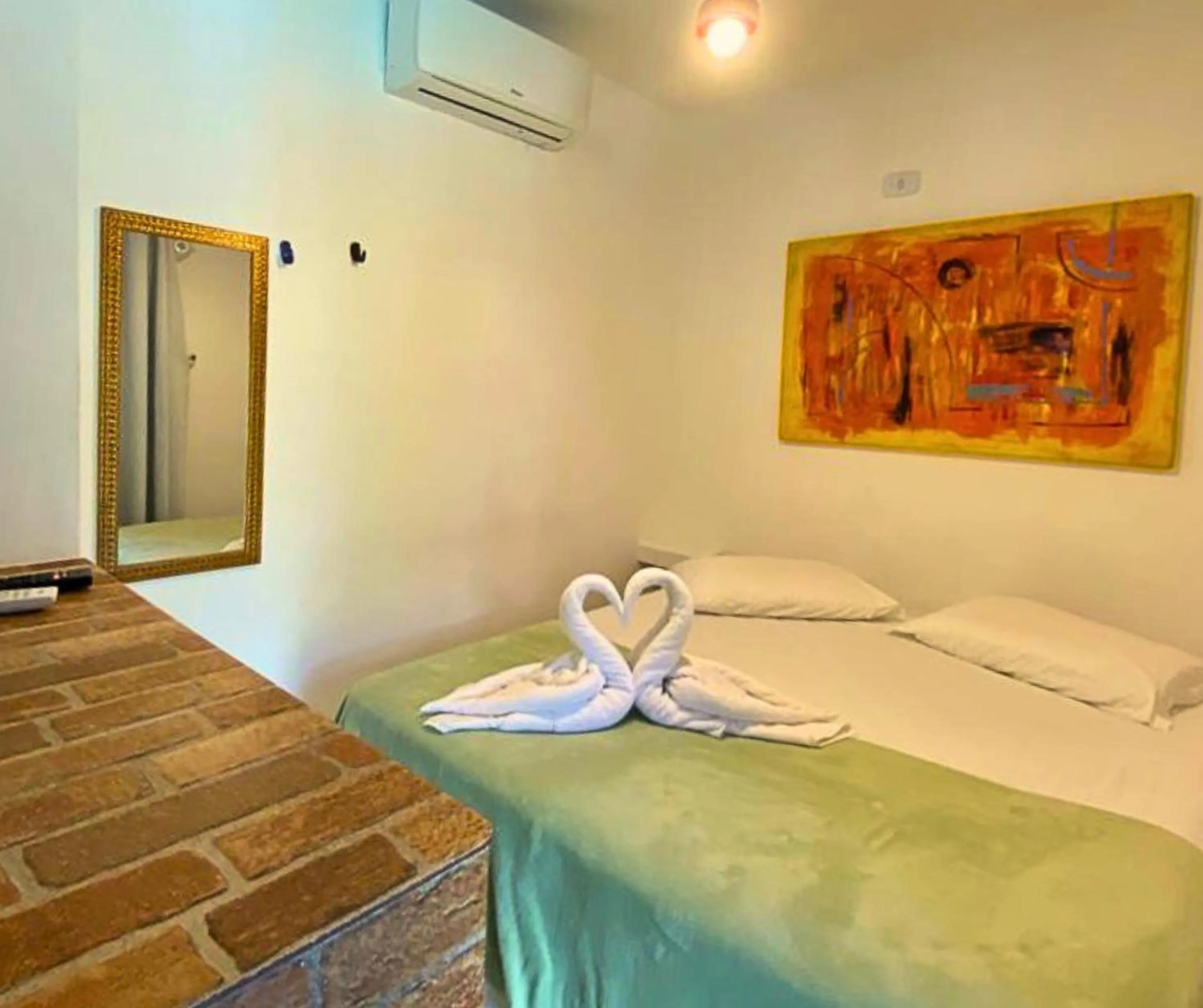 Bed in Pousada Papaya Container