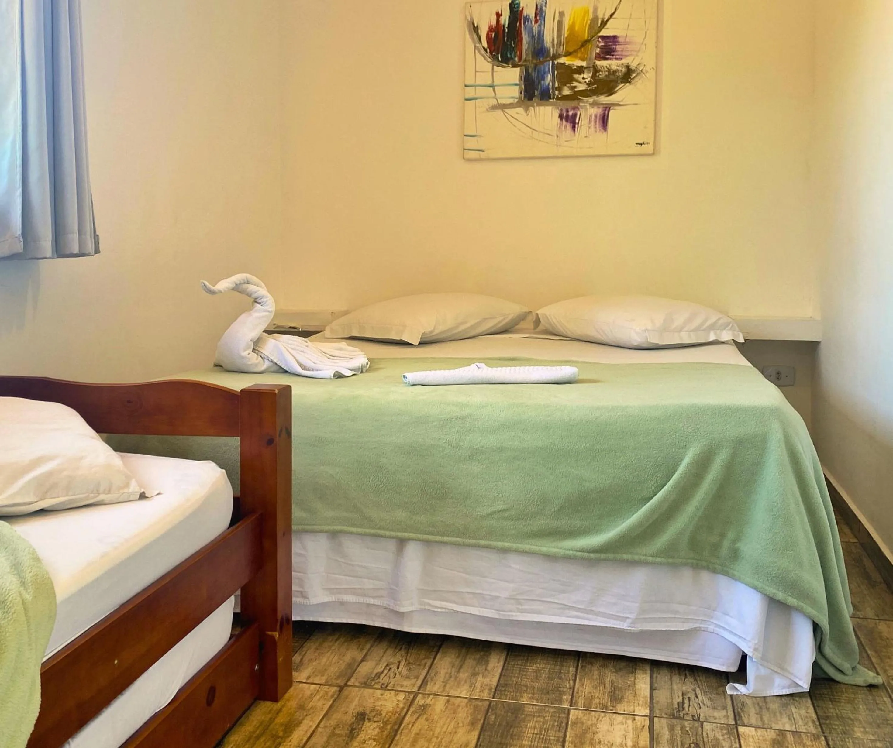 Bed in Pousada Papaya Container