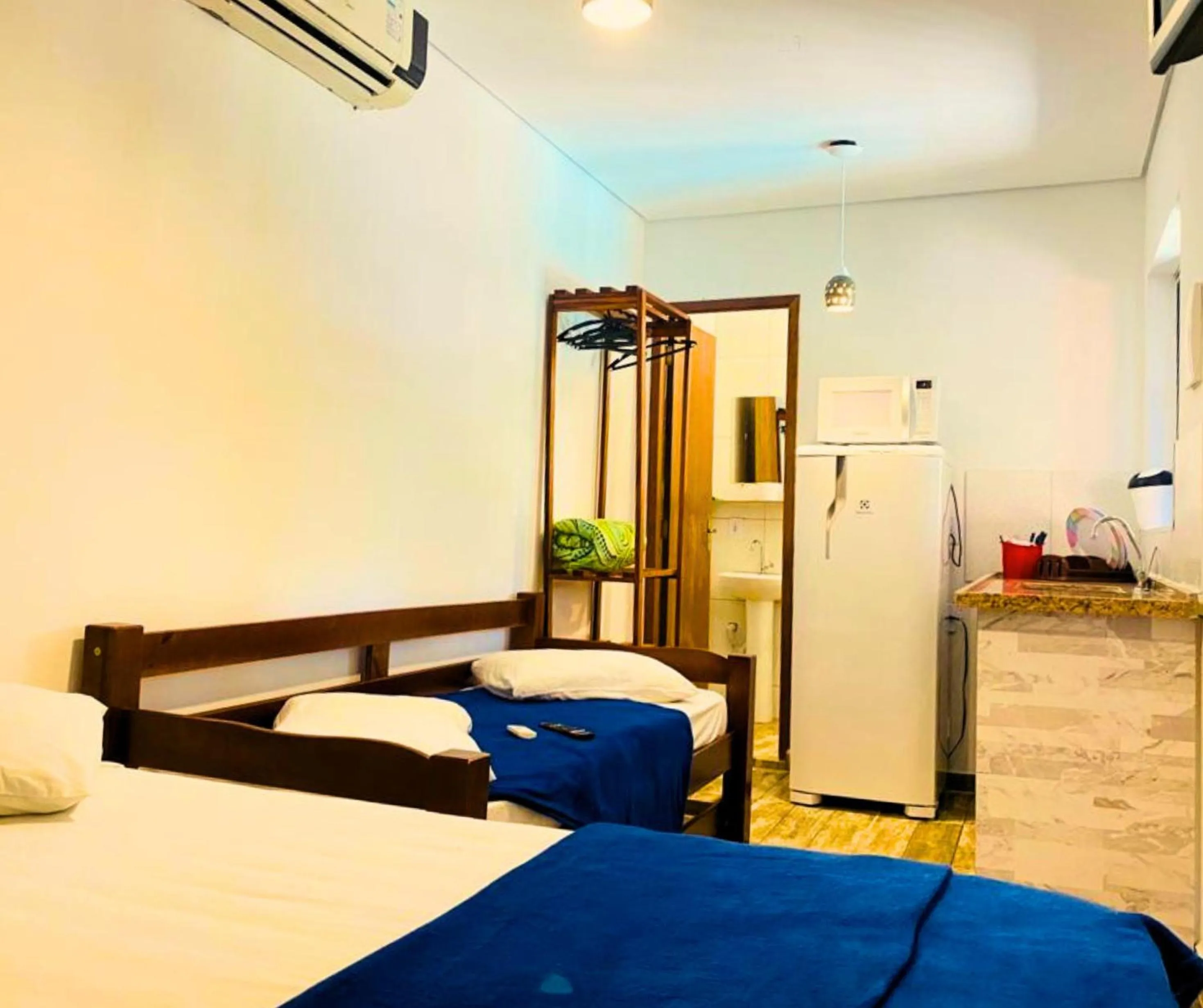 Bed in Pousada Papaya Container