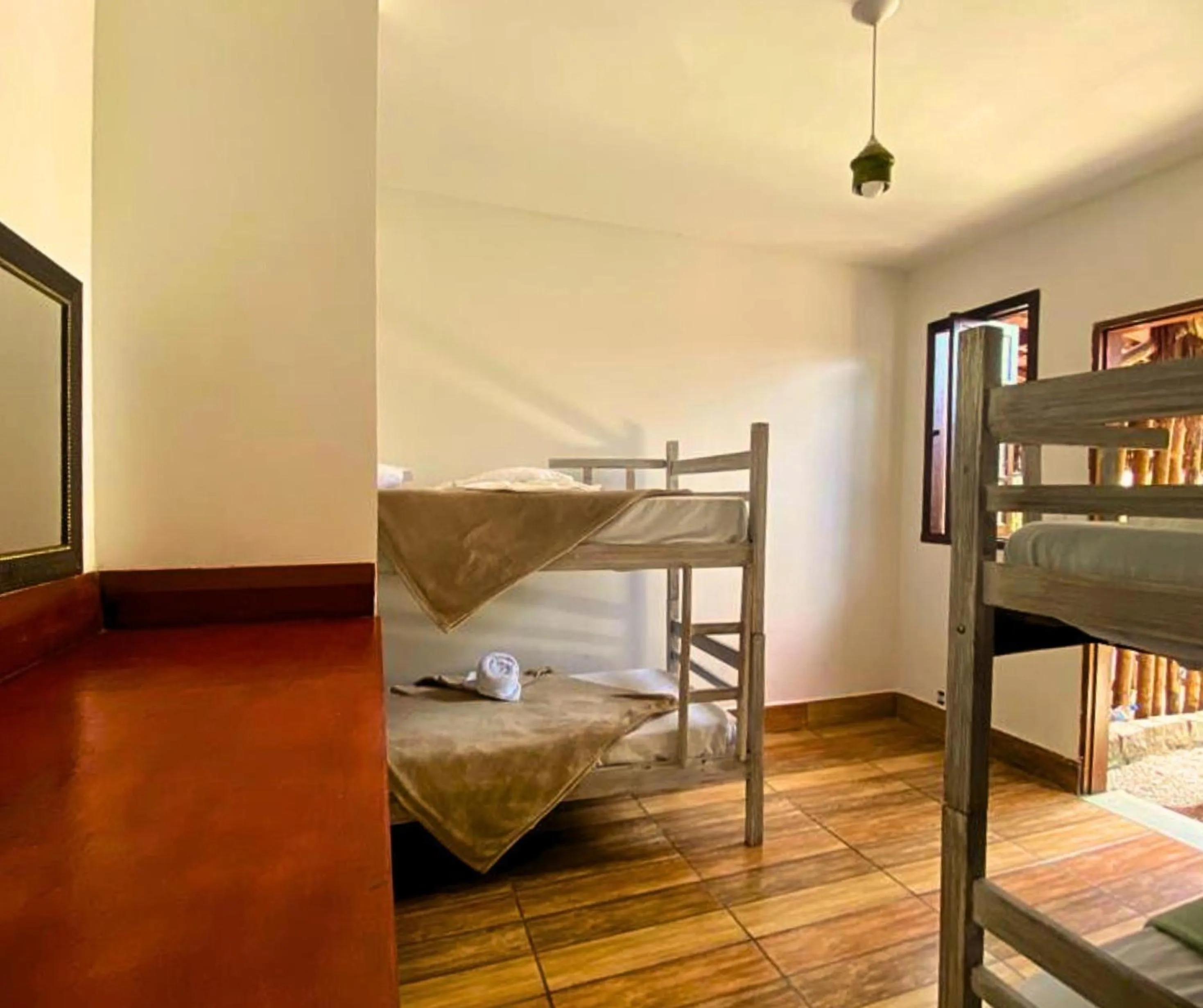 Bed in Pousada Papaya Container