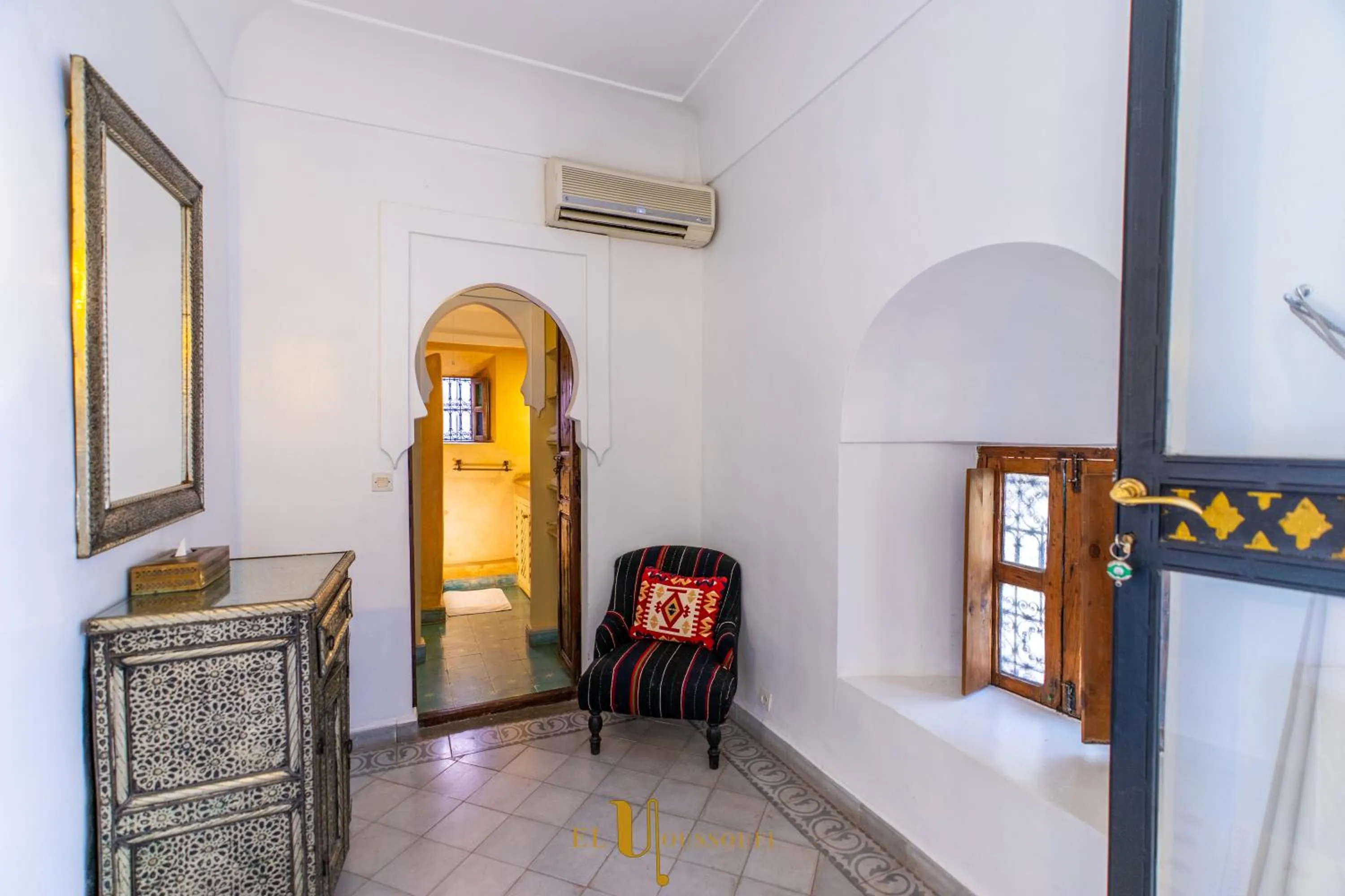 Seating area, Bed in Riad El Youssoufi