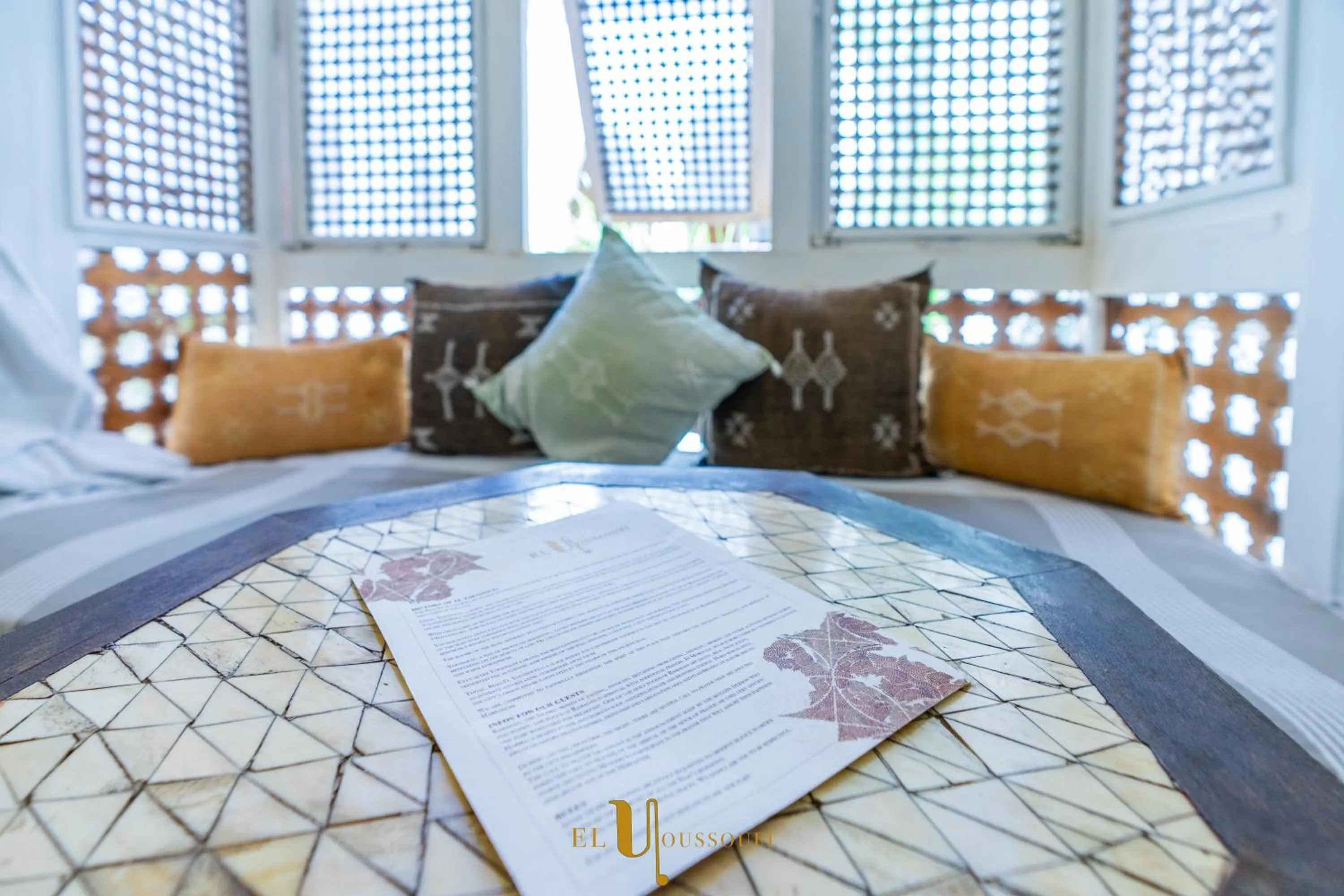 Seating area, Bed in Riad El Youssoufi