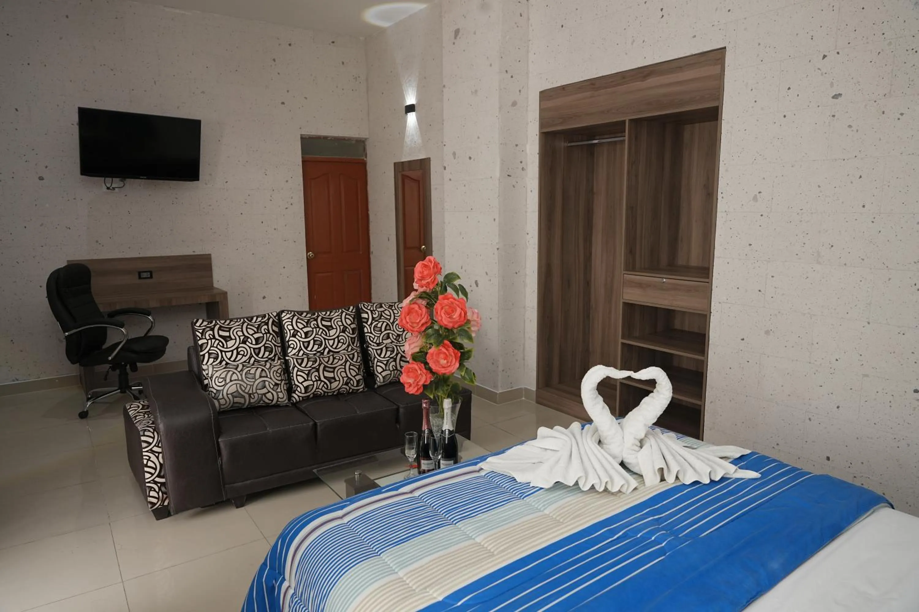 Living room, Bed in Hoteles Gutiérrez Mansión