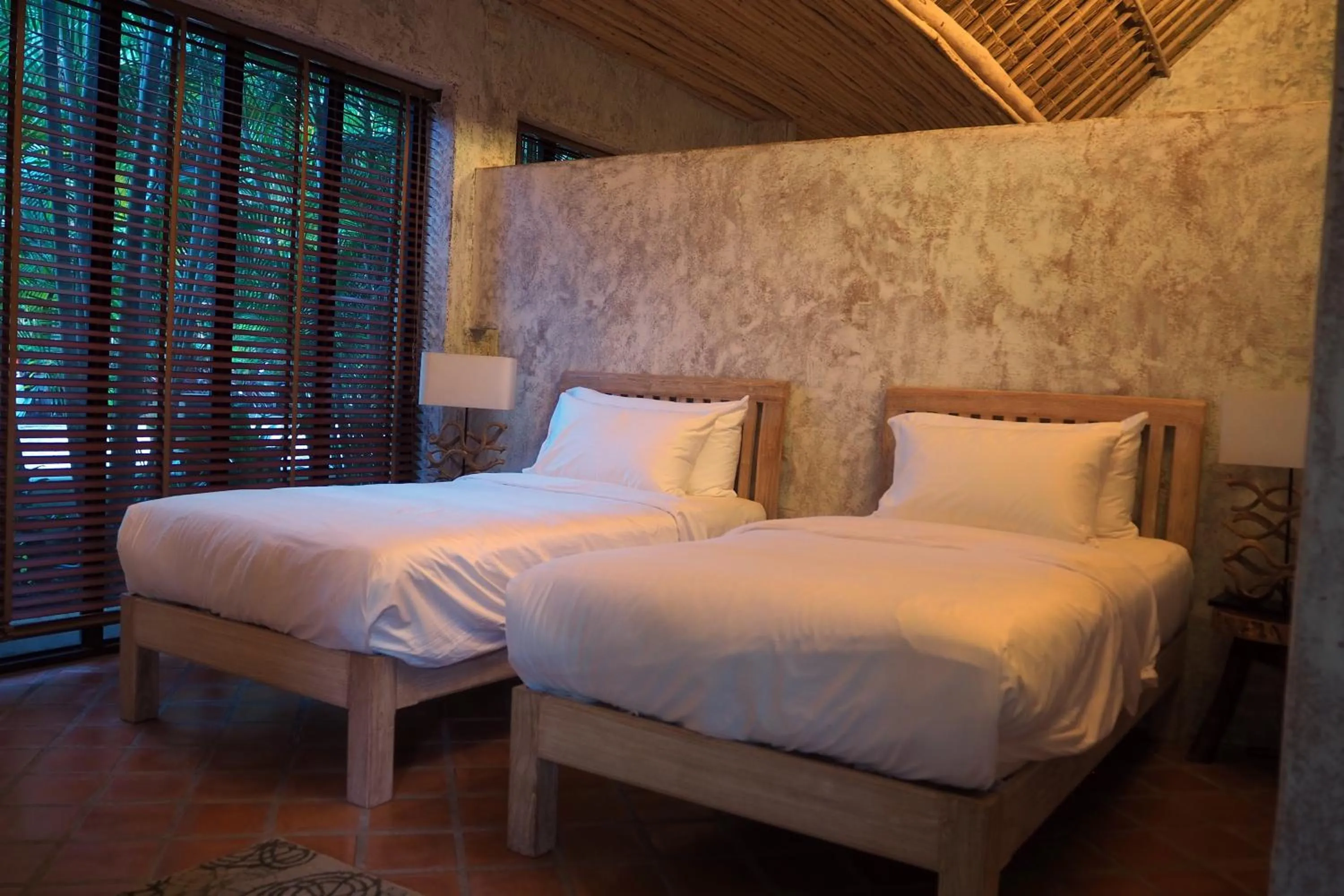 Bed in Baanpong Lodge
