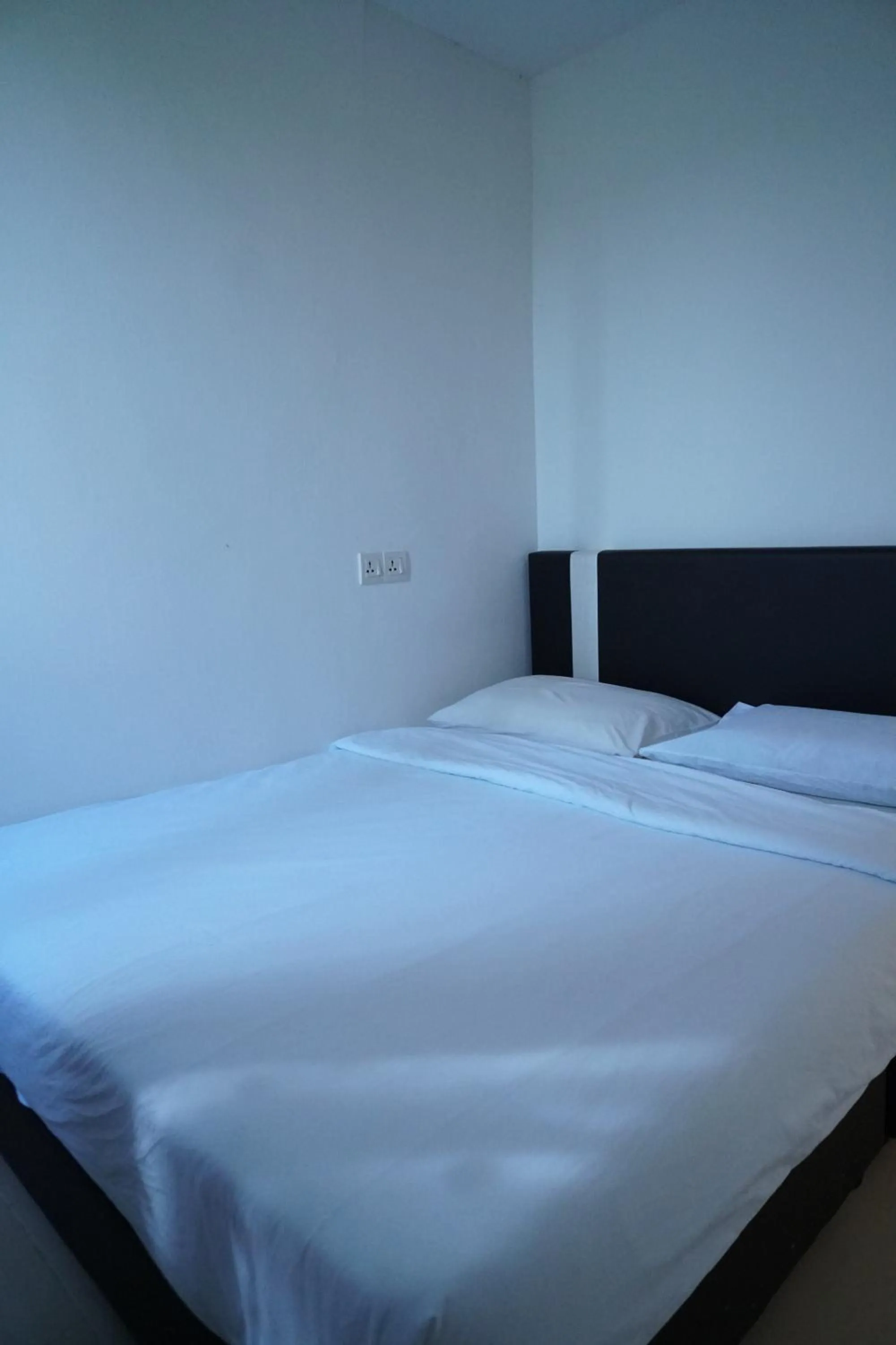 Bed in Pondok Muara Chalet