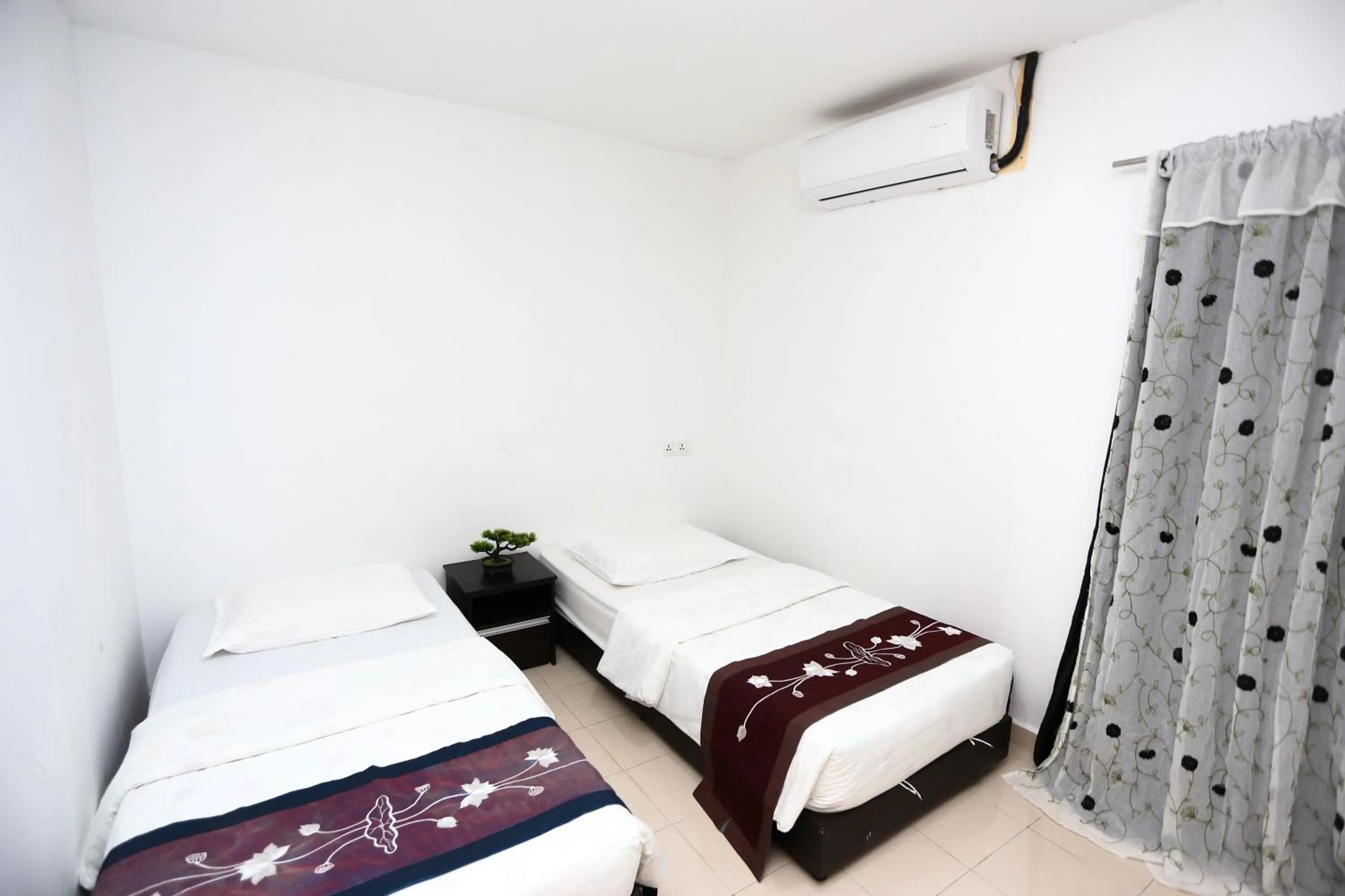 Bed in Pondok Muara Chalet