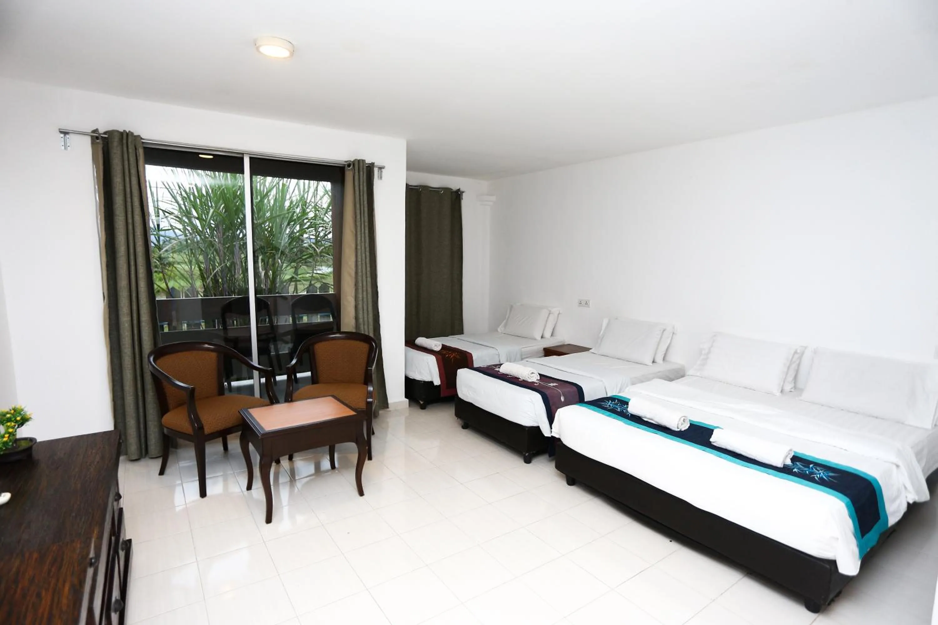 Bed in Pondok Muara Chalet