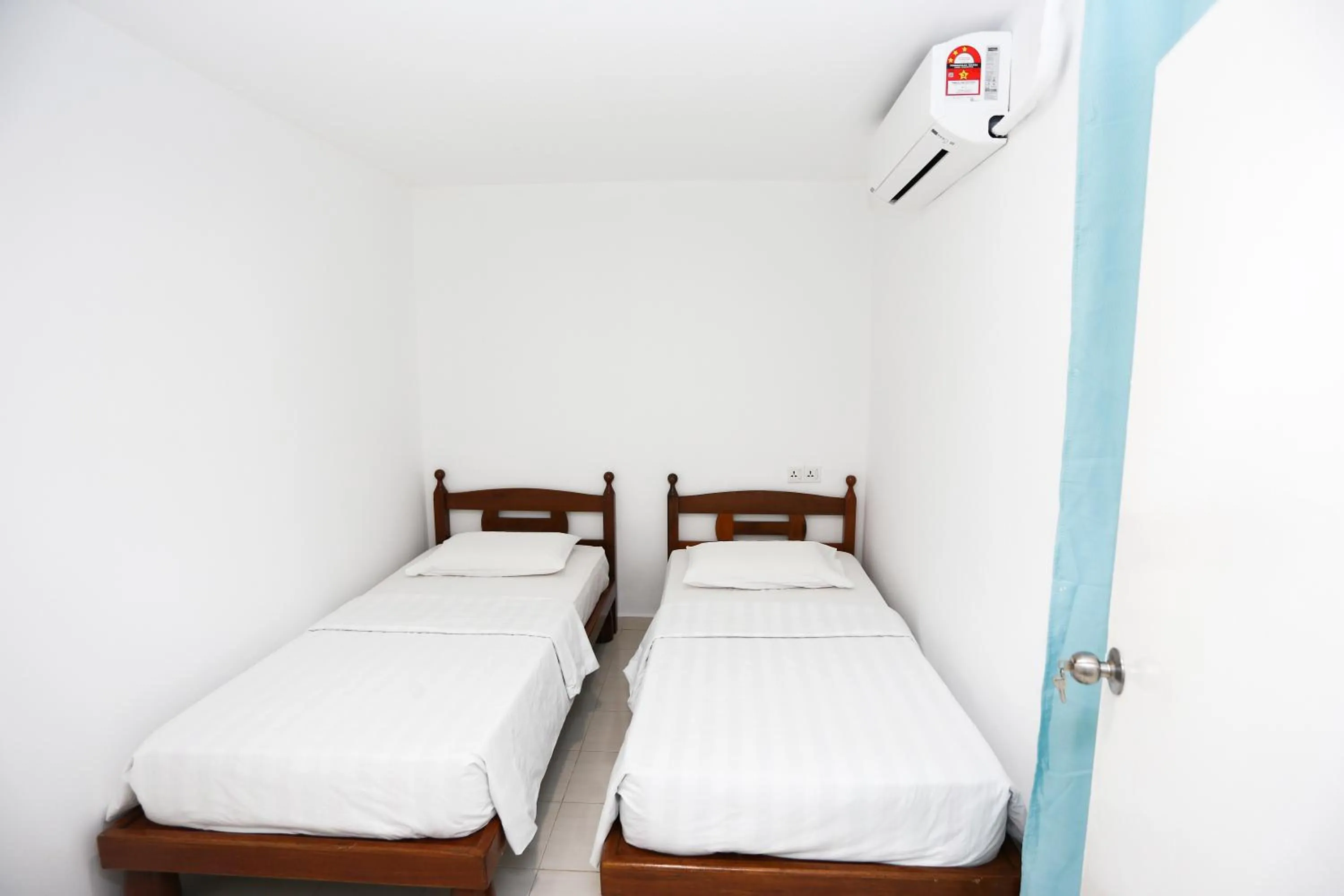 Bed in Pondok Muara Chalet