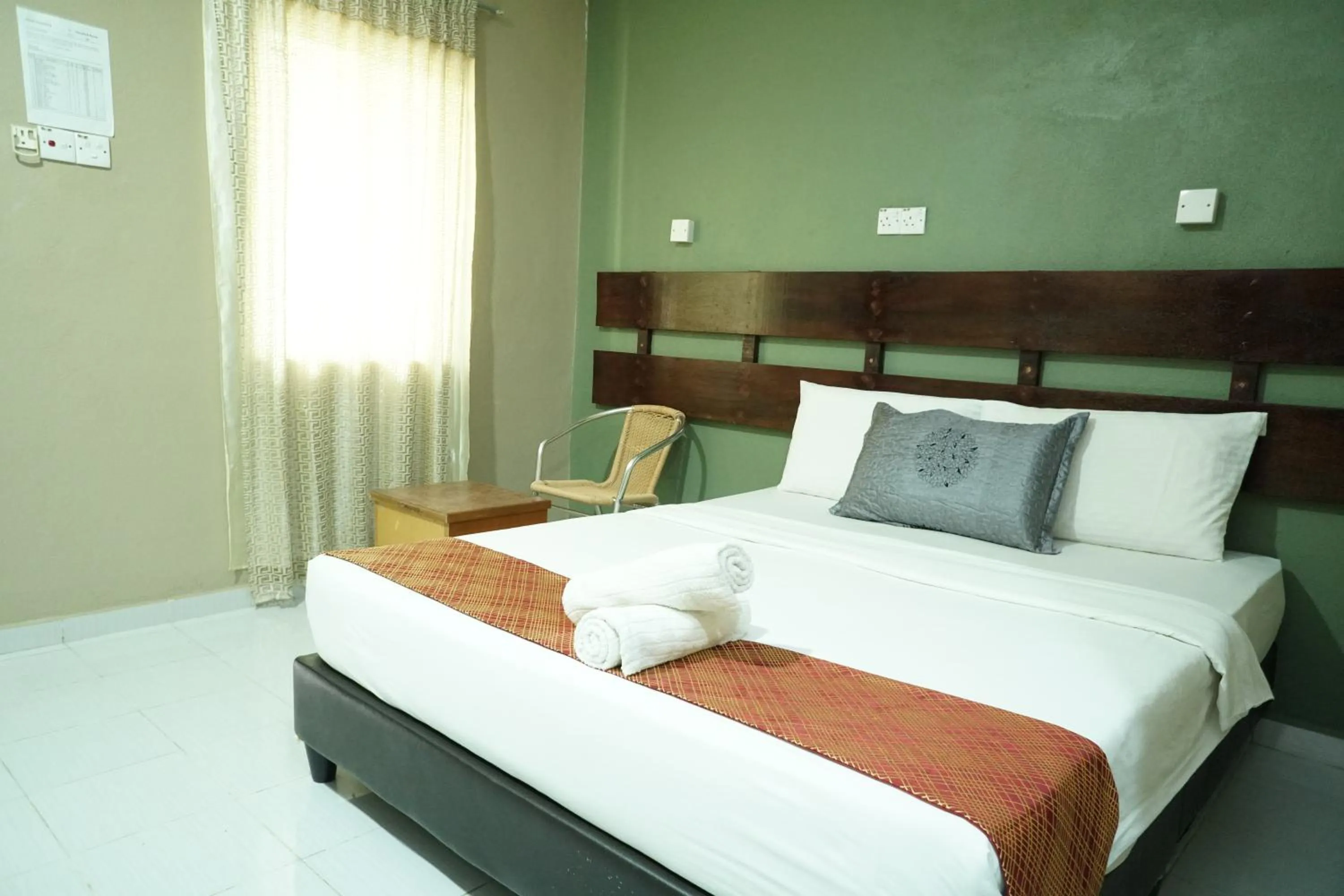 Bed in Pondok Muara Chalet