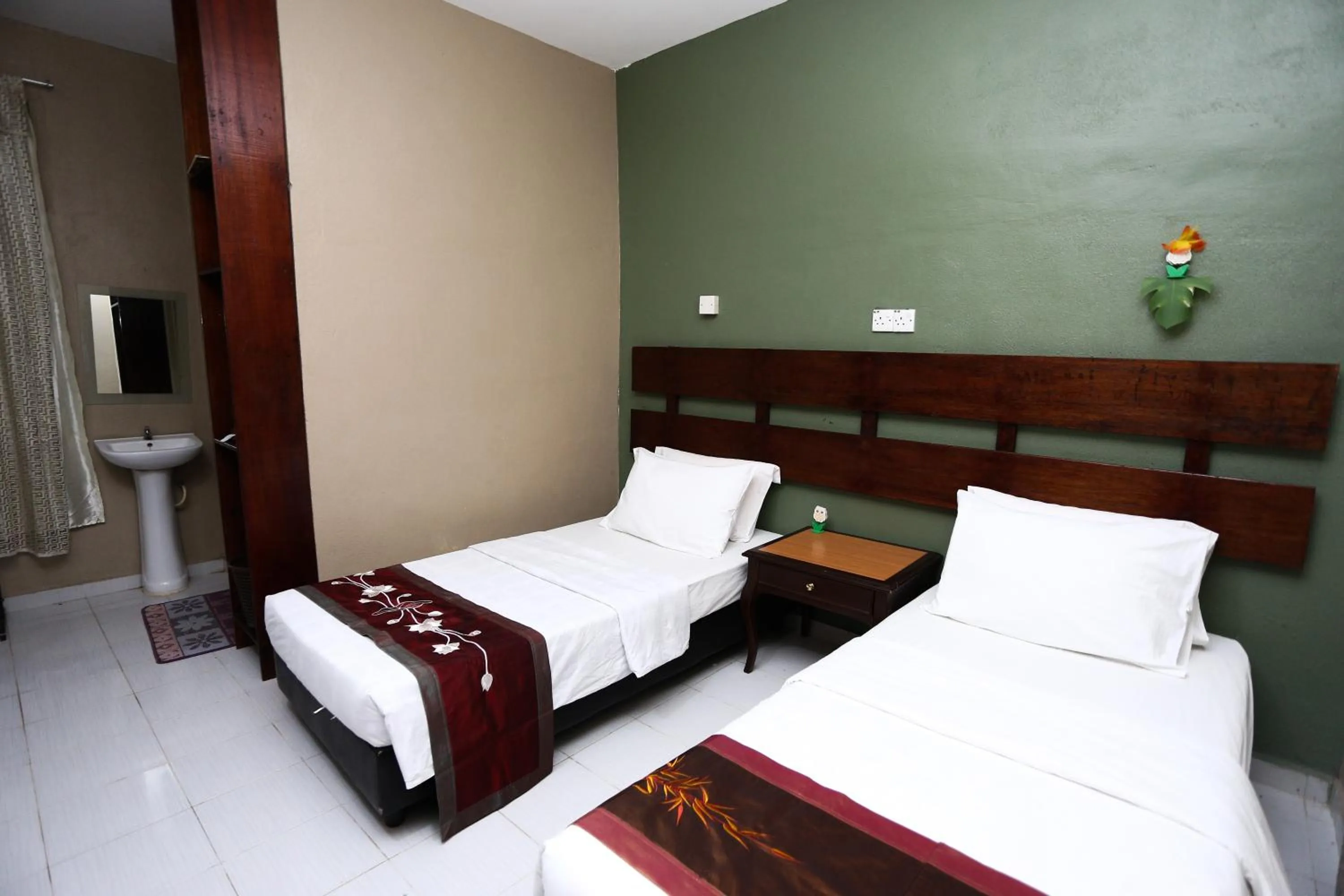 Bed in Pondok Muara Chalet