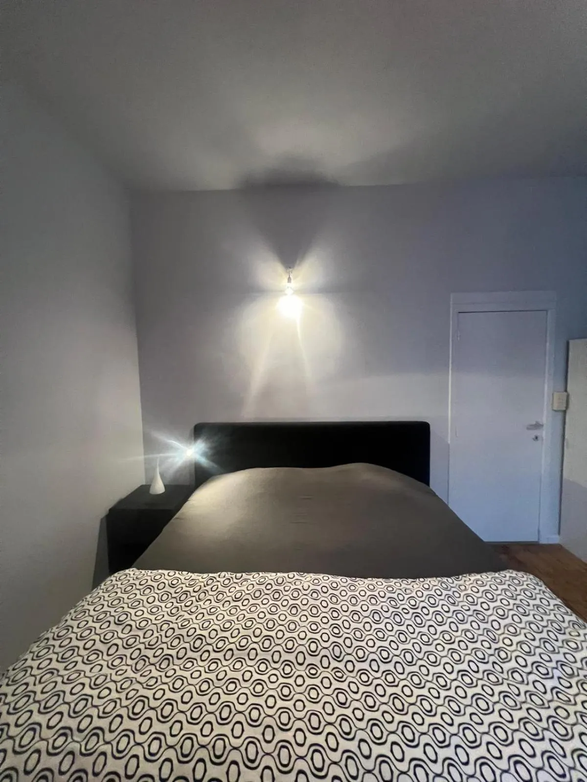 Bed in Because the Night city lodge