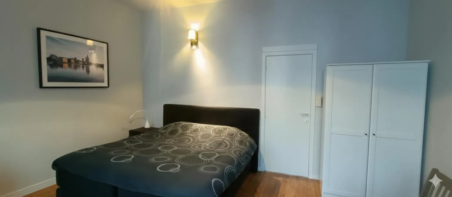 Bed in Because the Night city lodge