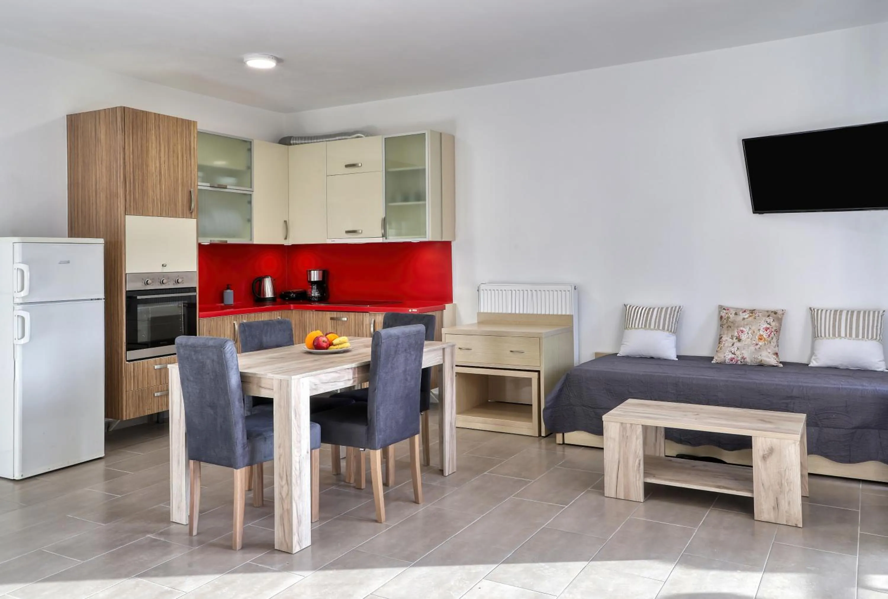 Bed in Helios Studios & Apartments