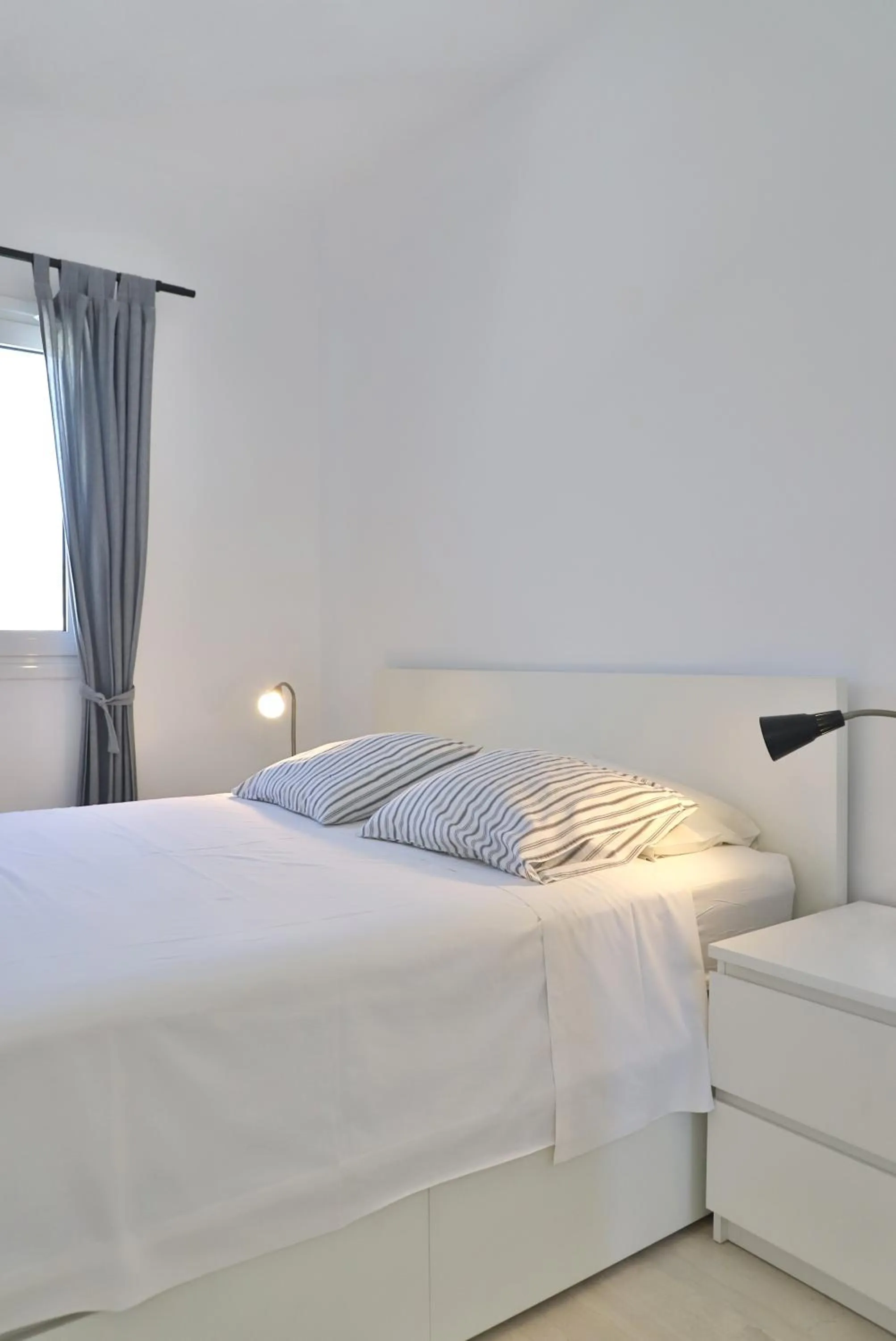 Bed in Helios Studios & Apartments