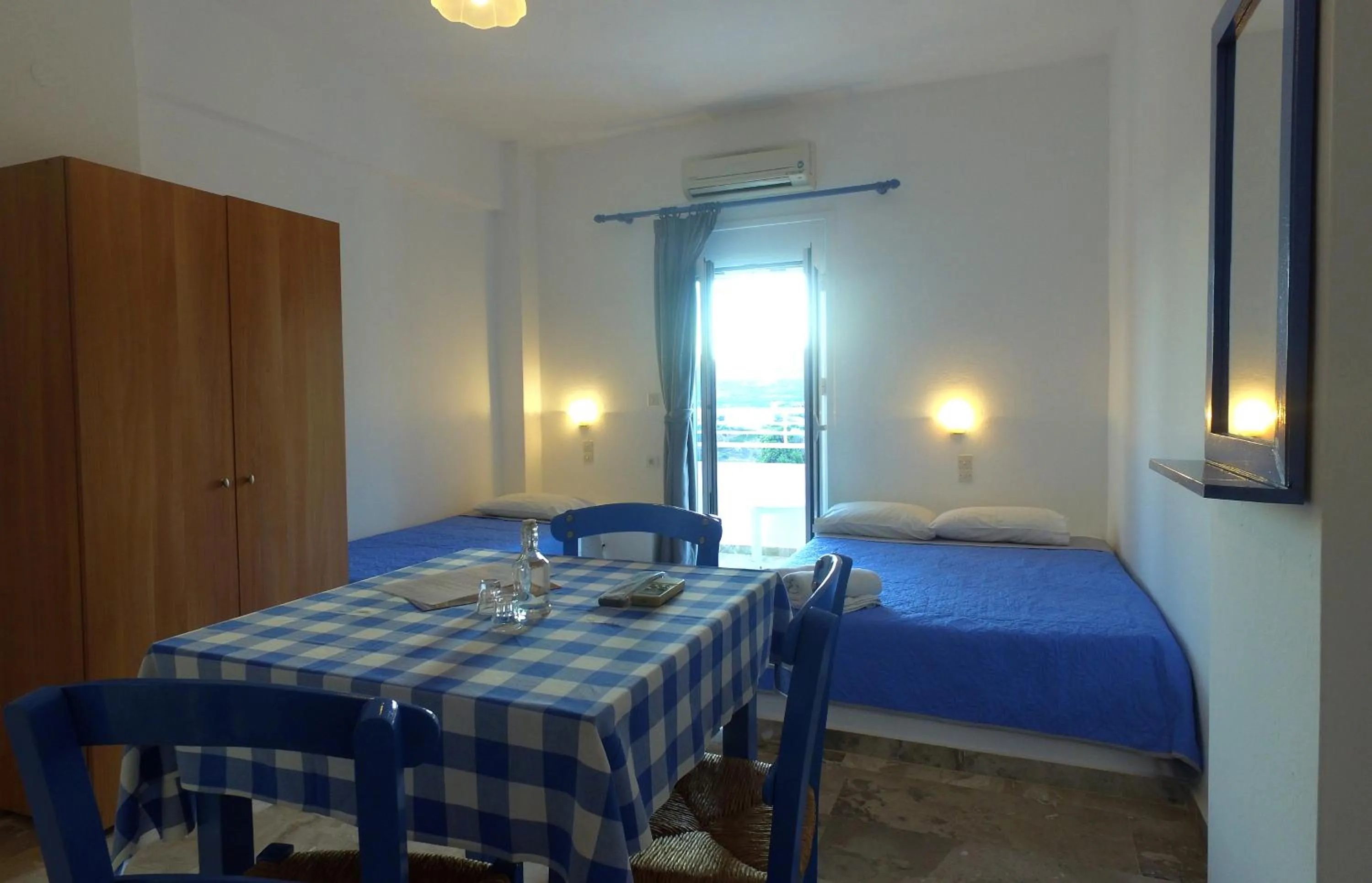 Bed in Helios Studios & Apartments