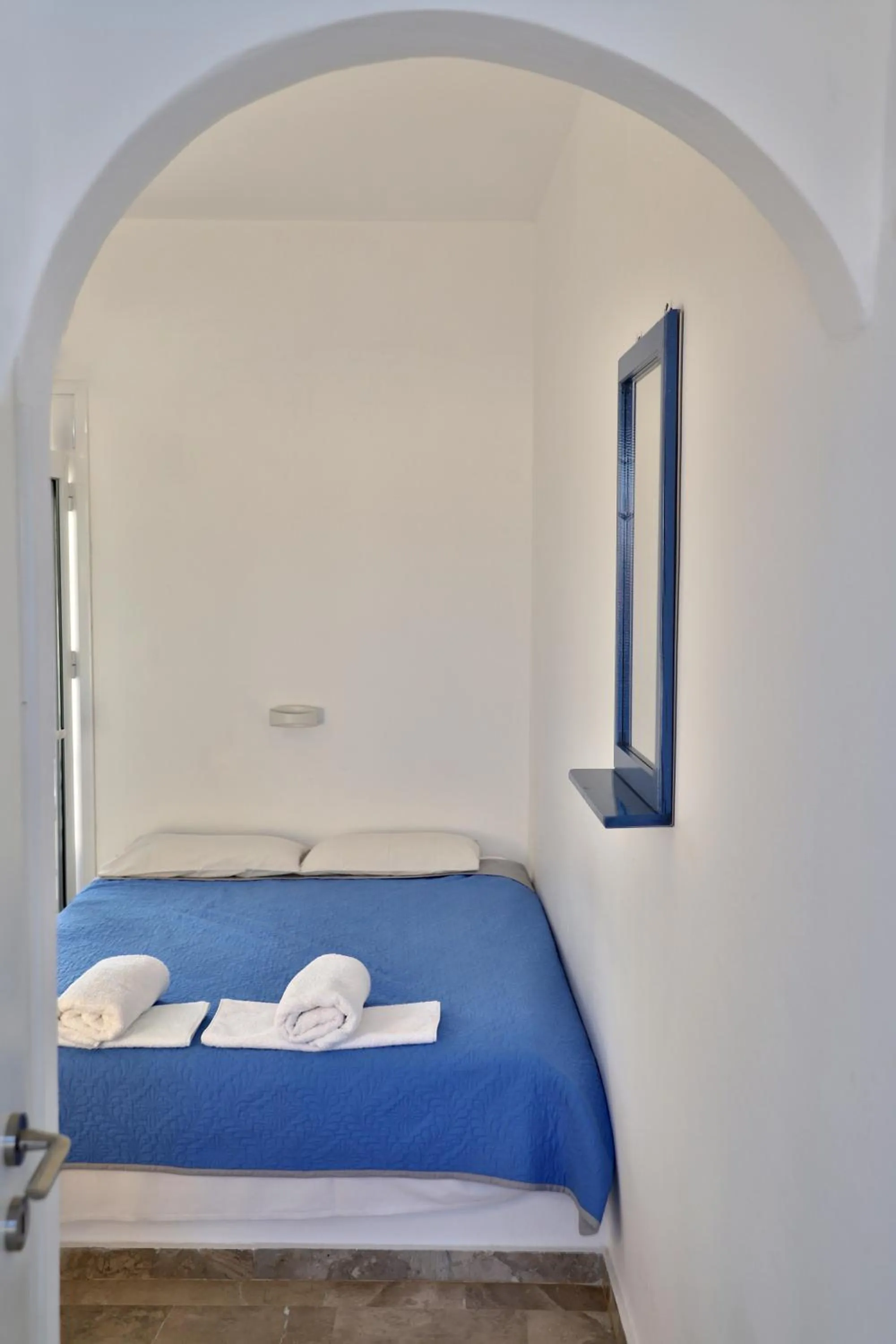 Bed in Helios Studios & Apartments