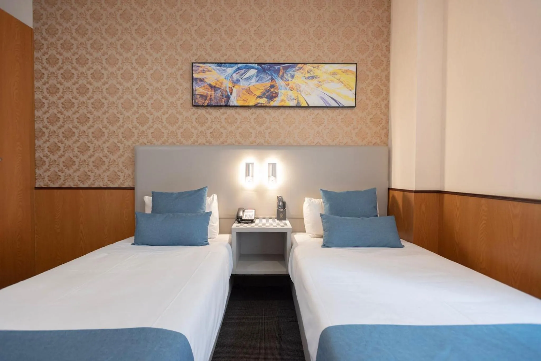 Bed in YEHS Hotel Sydney QVB