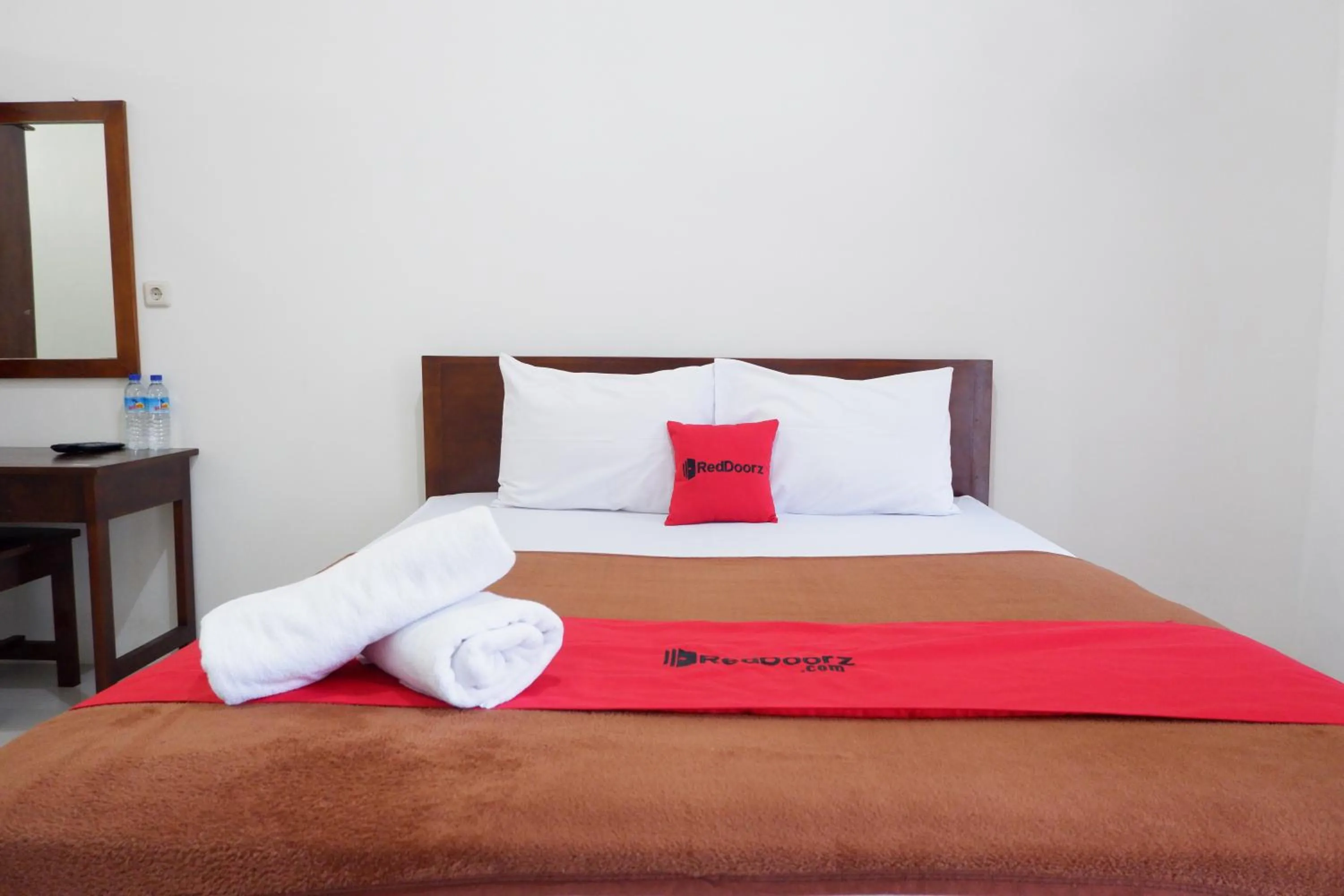 Bed in Reddoorz at Bale Eja Syariah Senggigi