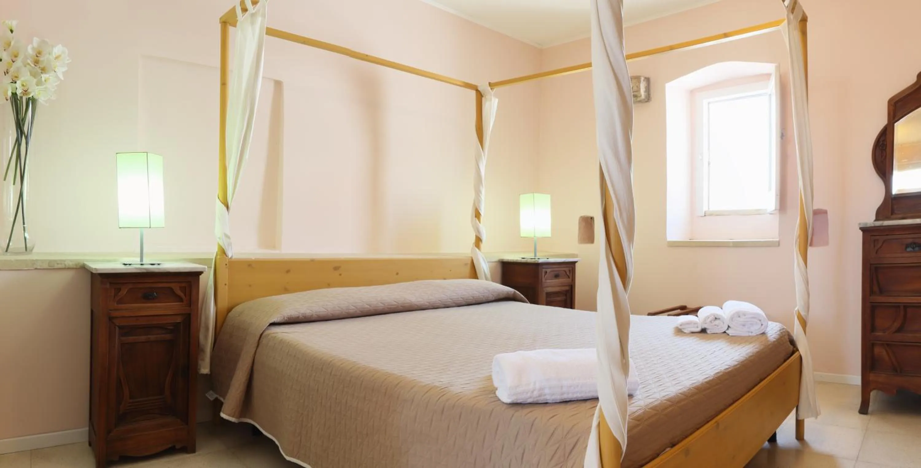 Bed in B&B Dimora Muzio and Restaurant