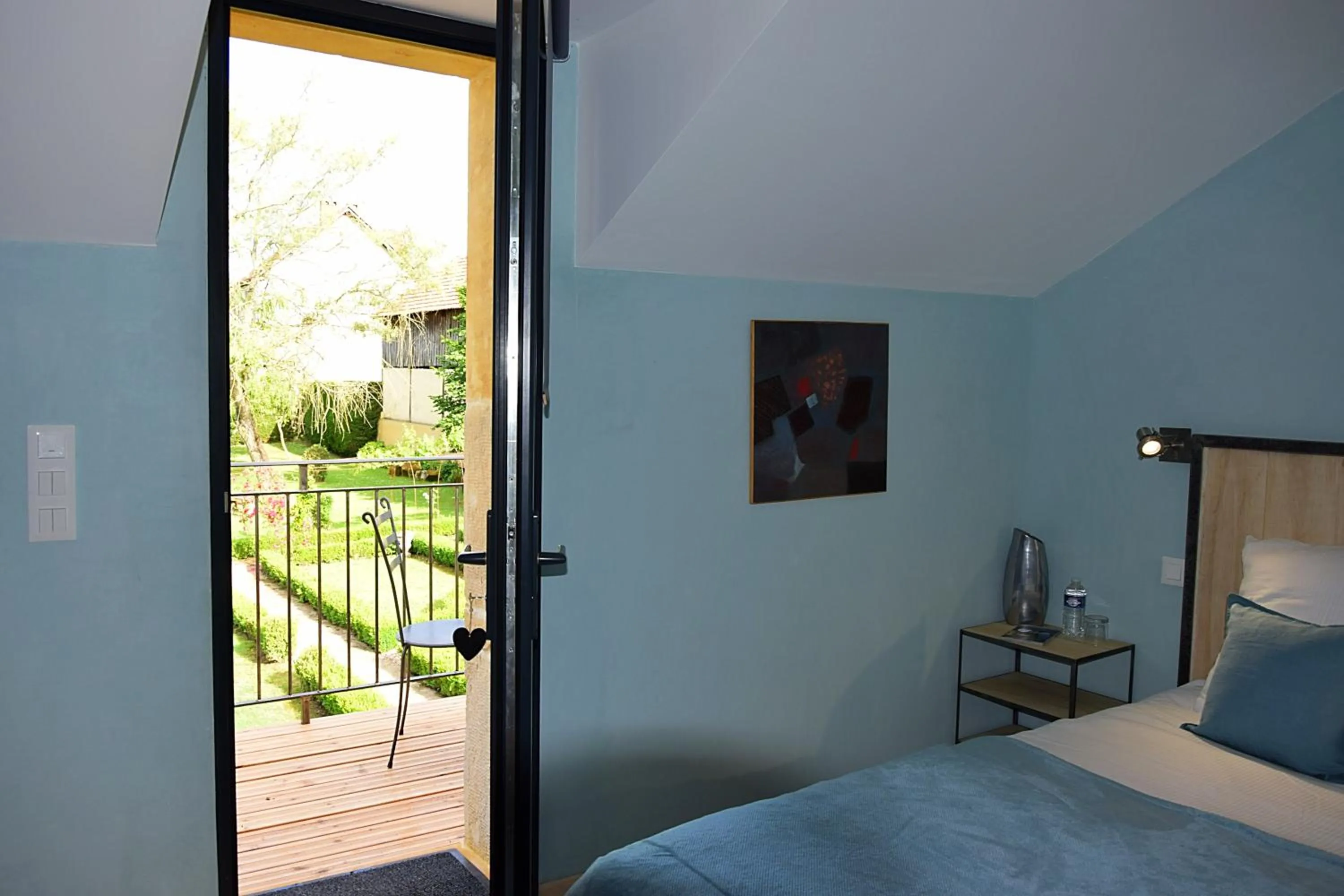 Bed in L'Intemporelle B&B