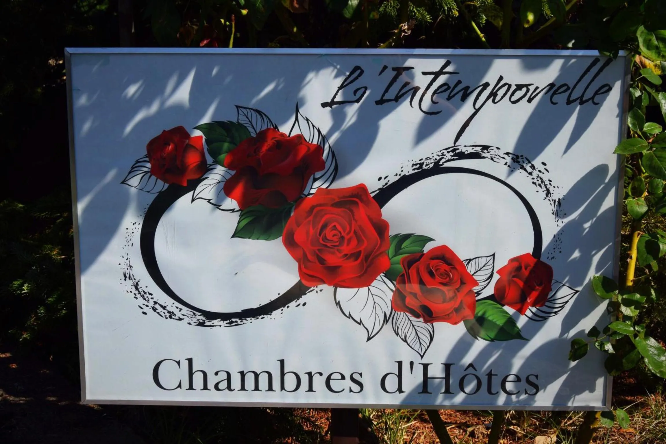 Property logo or sign in L'Intemporelle B&B