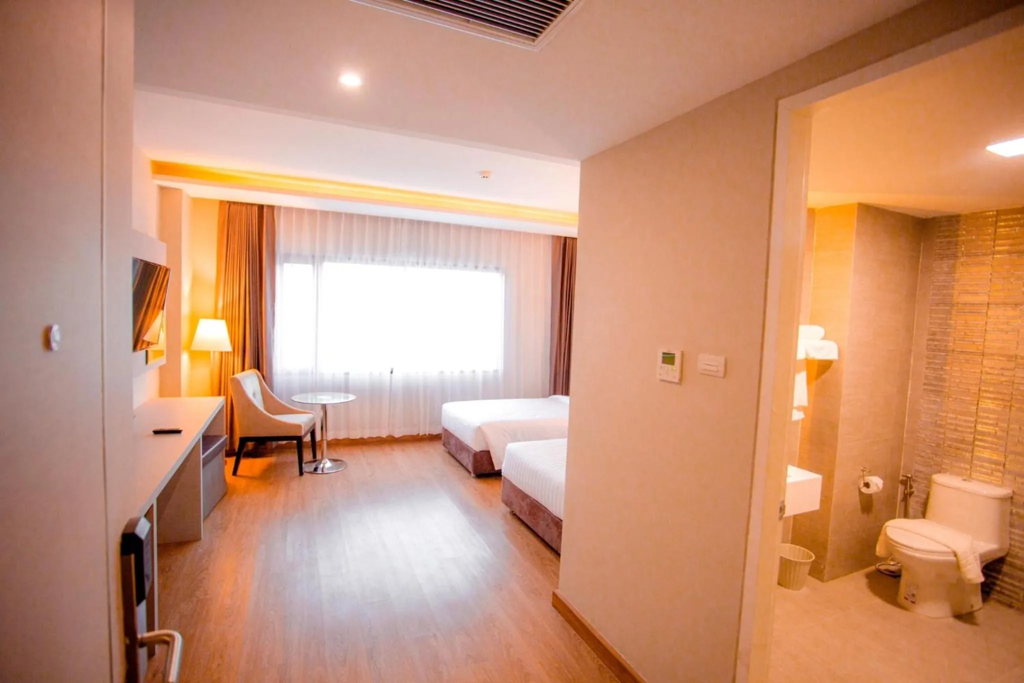 Bed in The Cheewin Hotel And Convention