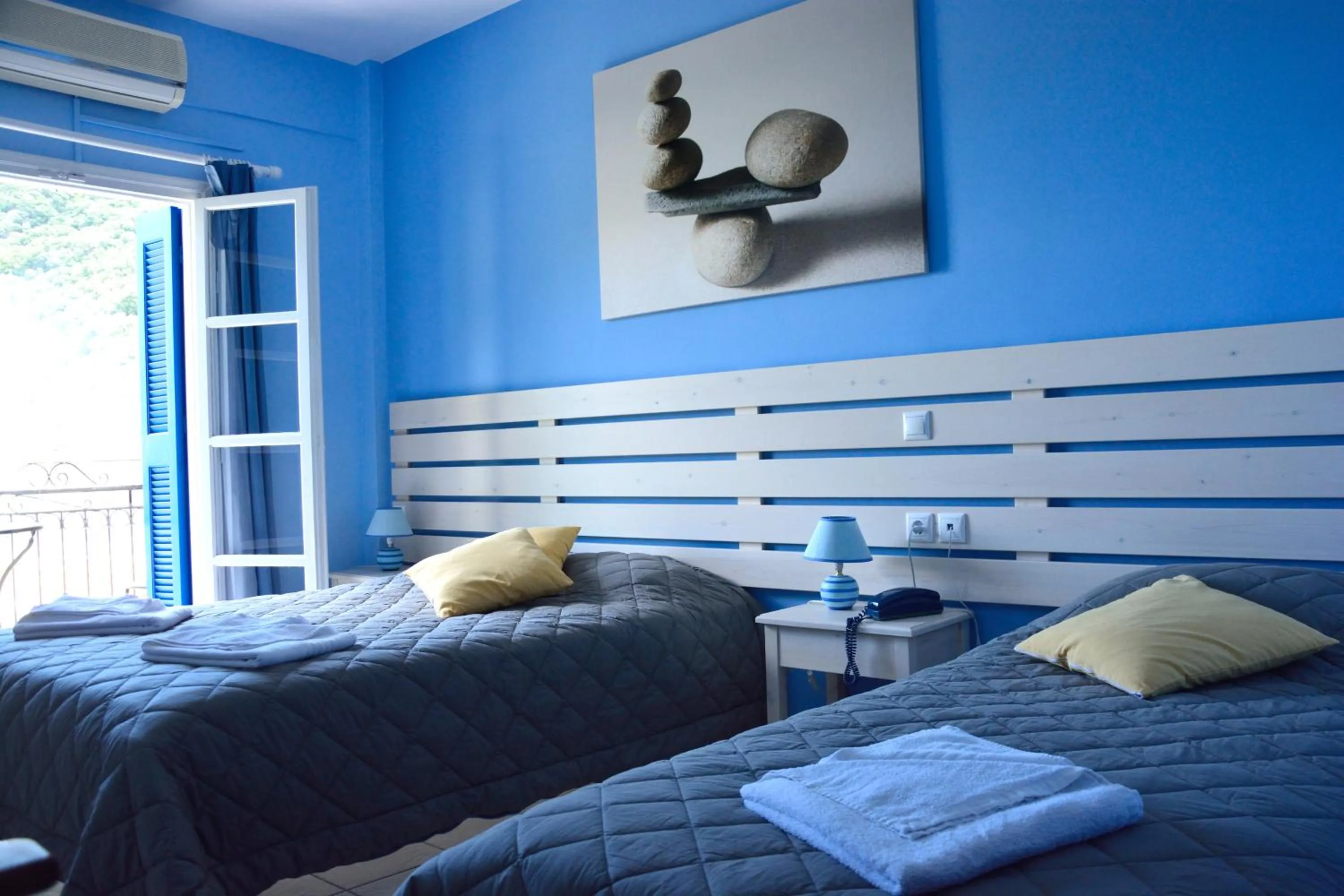 Decorative detail, Bed in Hotel Nostos