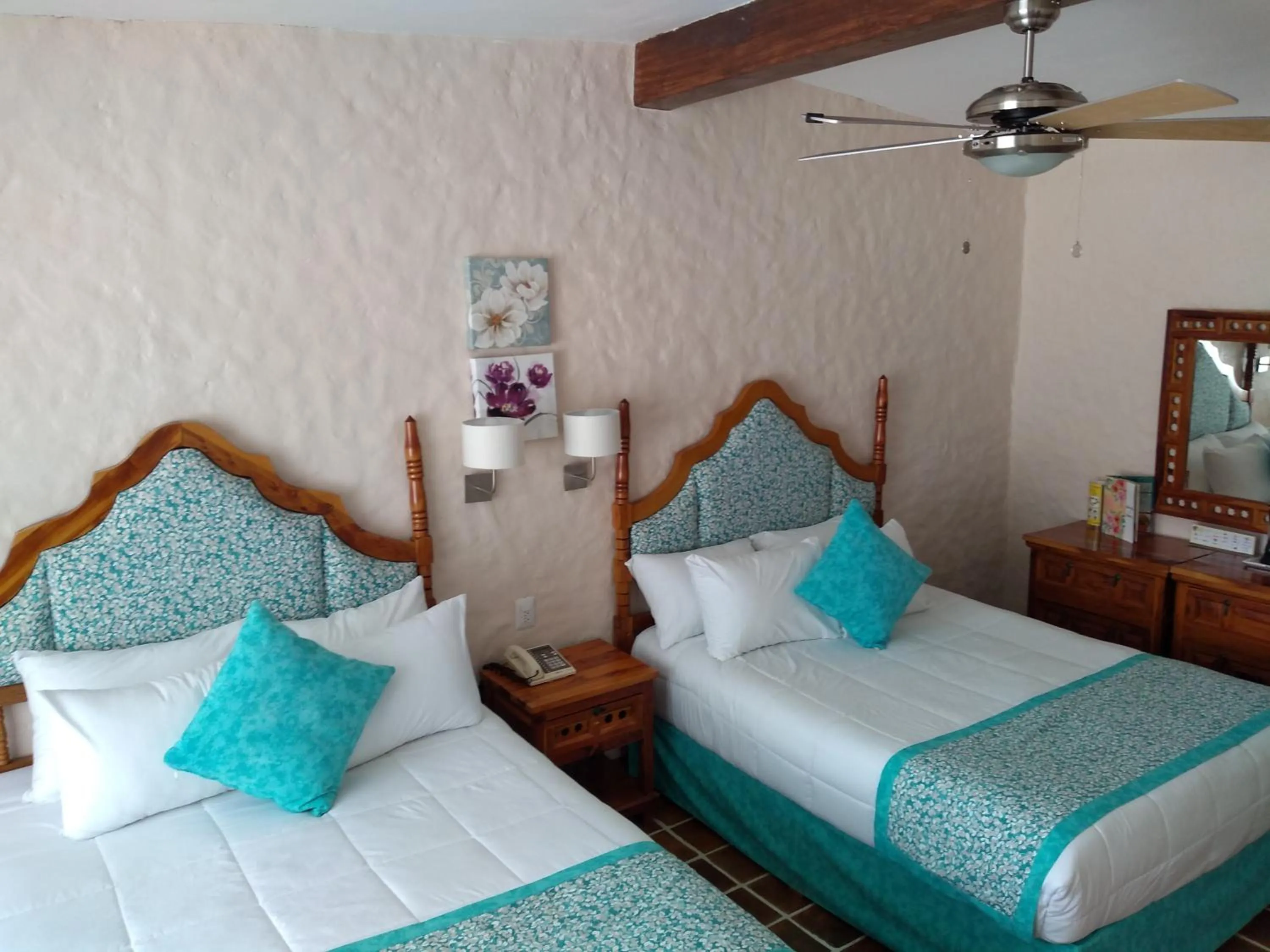 Bed in Hotel Posada Quinta Las Flores