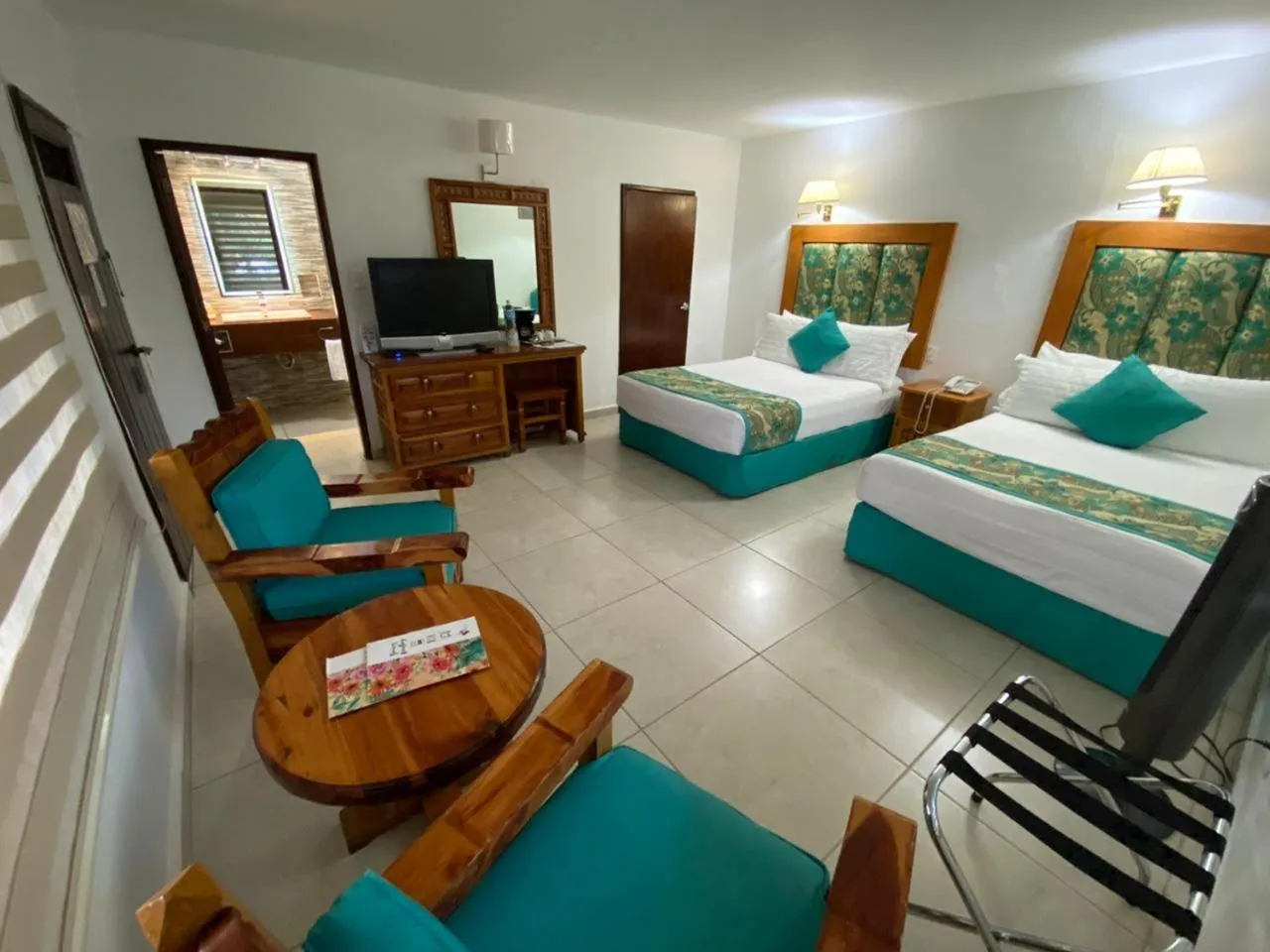 Photo of the whole room, Bed in Hotel Posada Quinta Las Flores