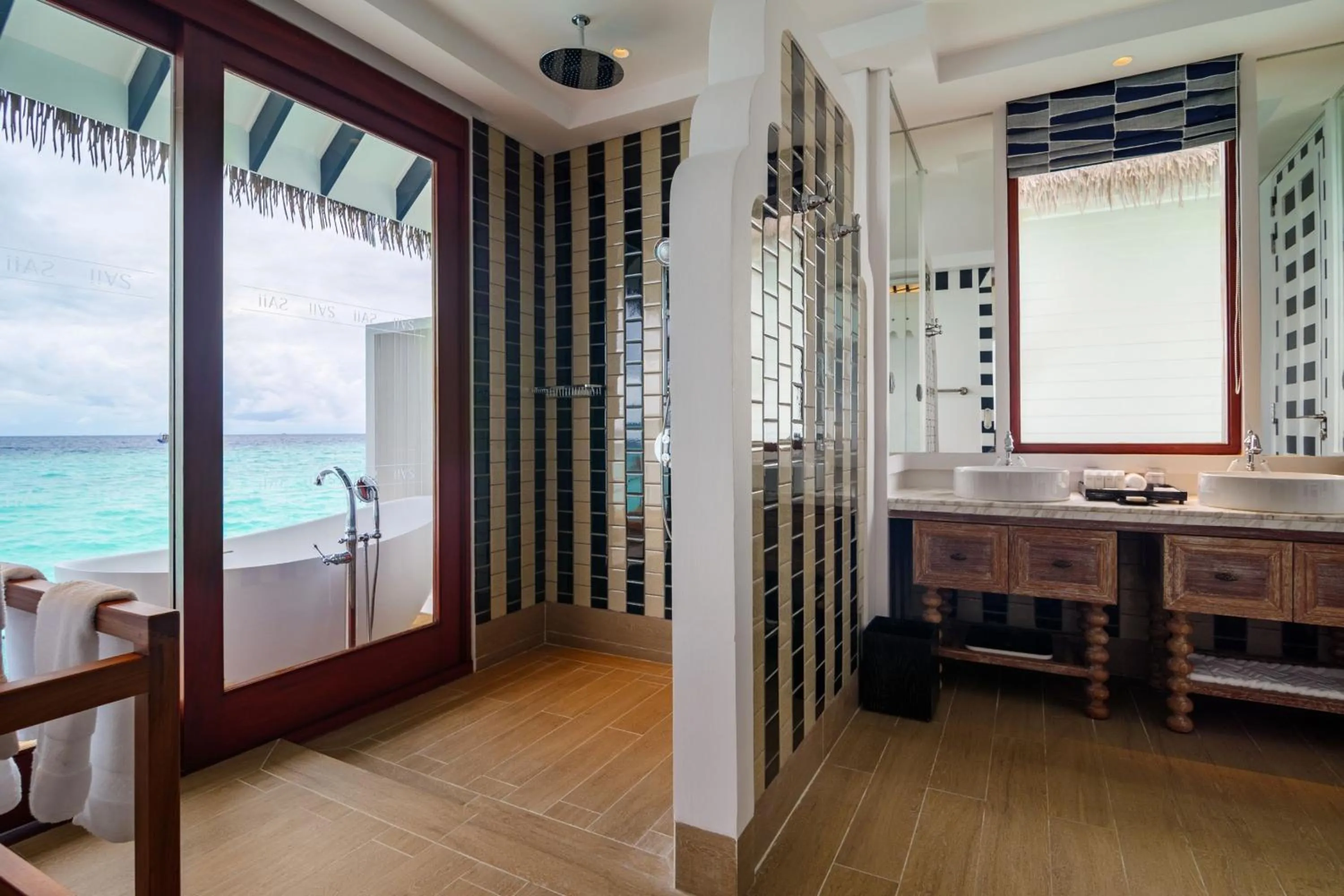 Bathroom in SAii Lagoon Maldives, Curio Collection By Hilton