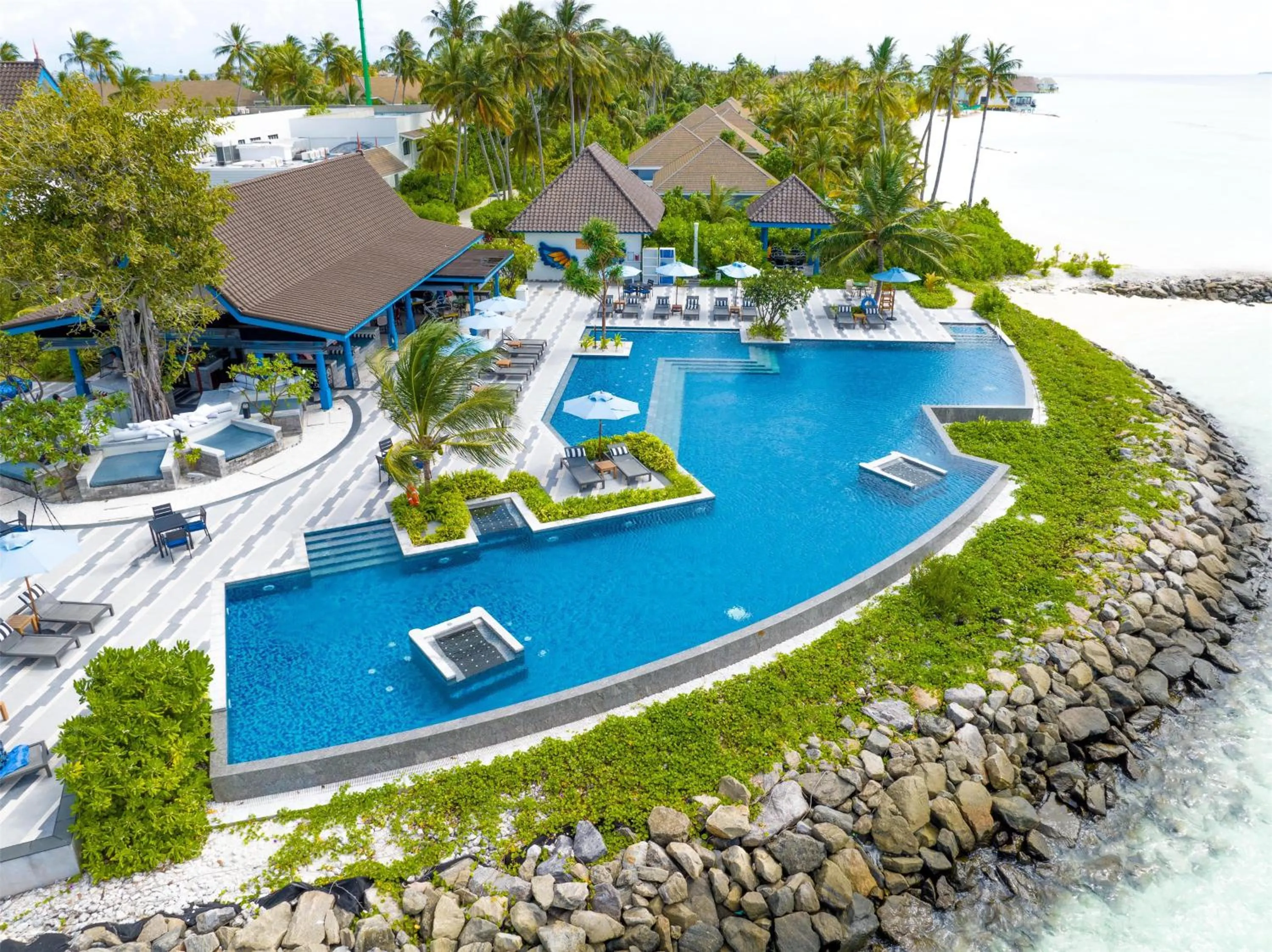 Pool view in SAii Lagoon Maldives, Curio Collection By Hilton