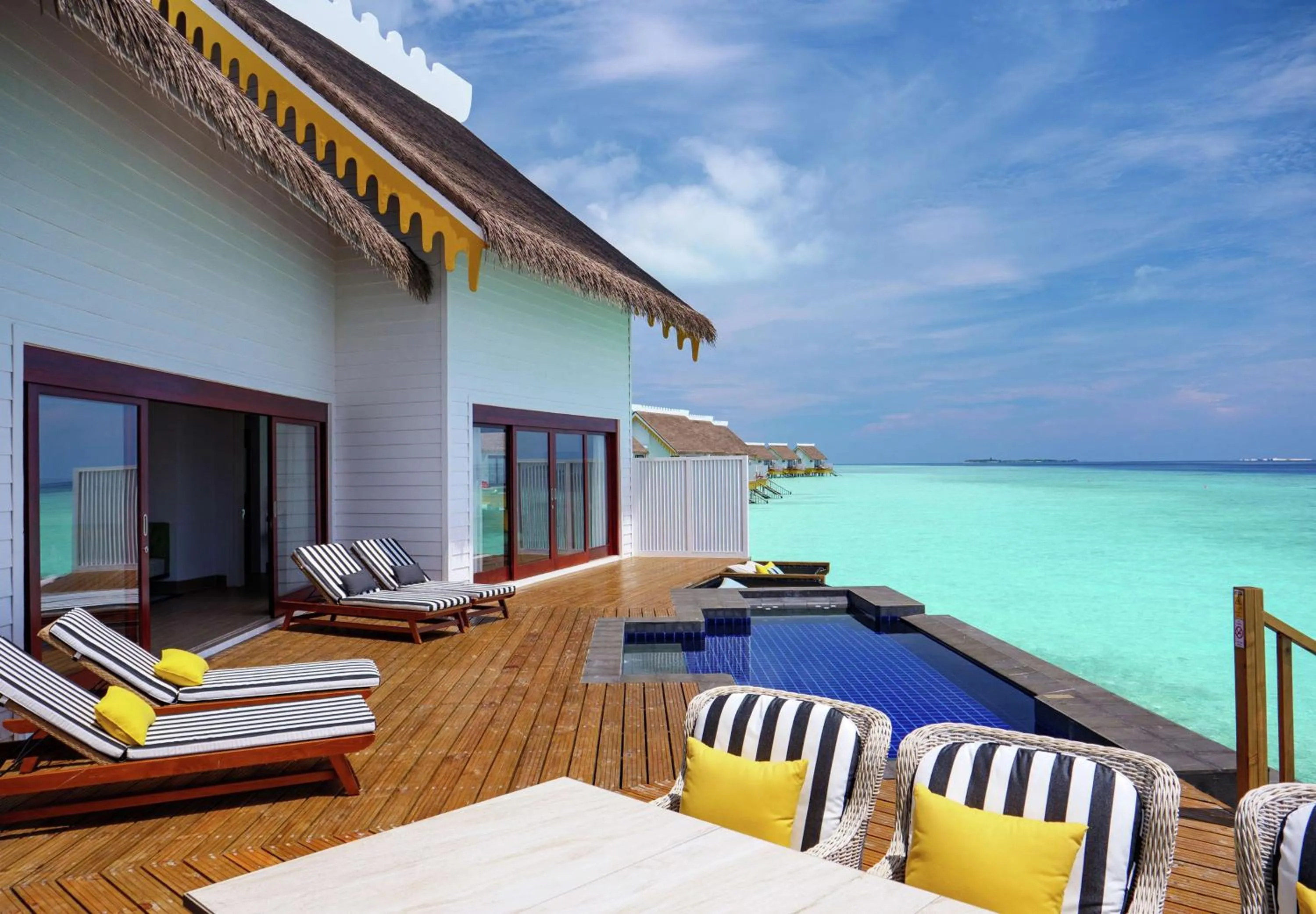 Patio in SAii Lagoon Maldives, Curio Collection By Hilton