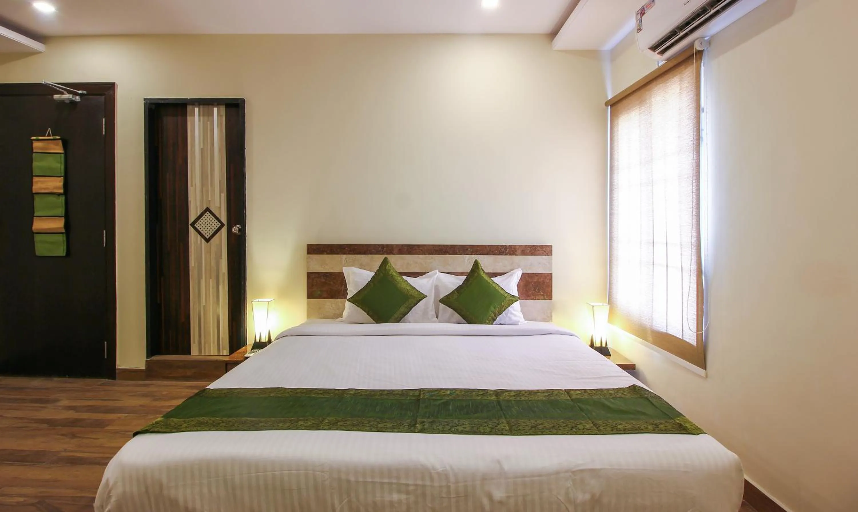 Bedroom, Bed in Treebo Address Inn, Banjara Hills