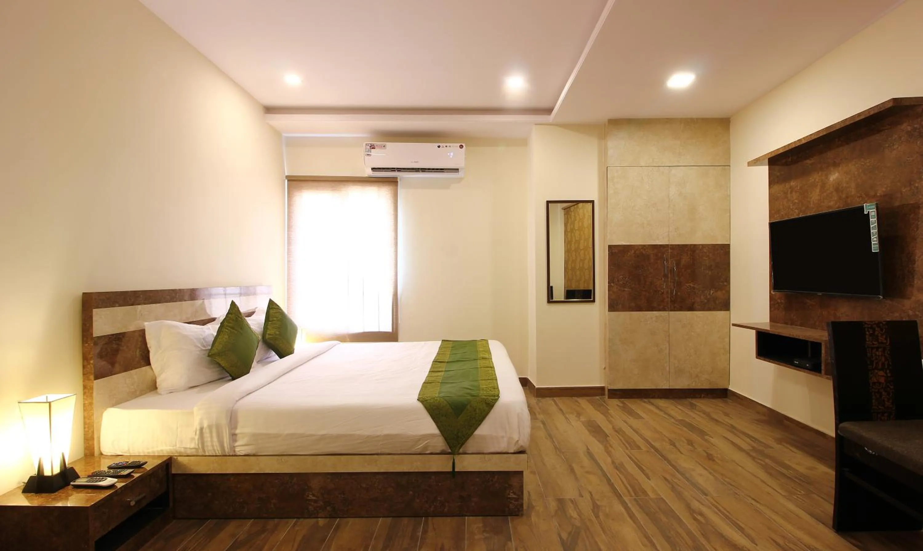 Photo of the whole room, Bed in Treebo Address Inn, Banjara Hills