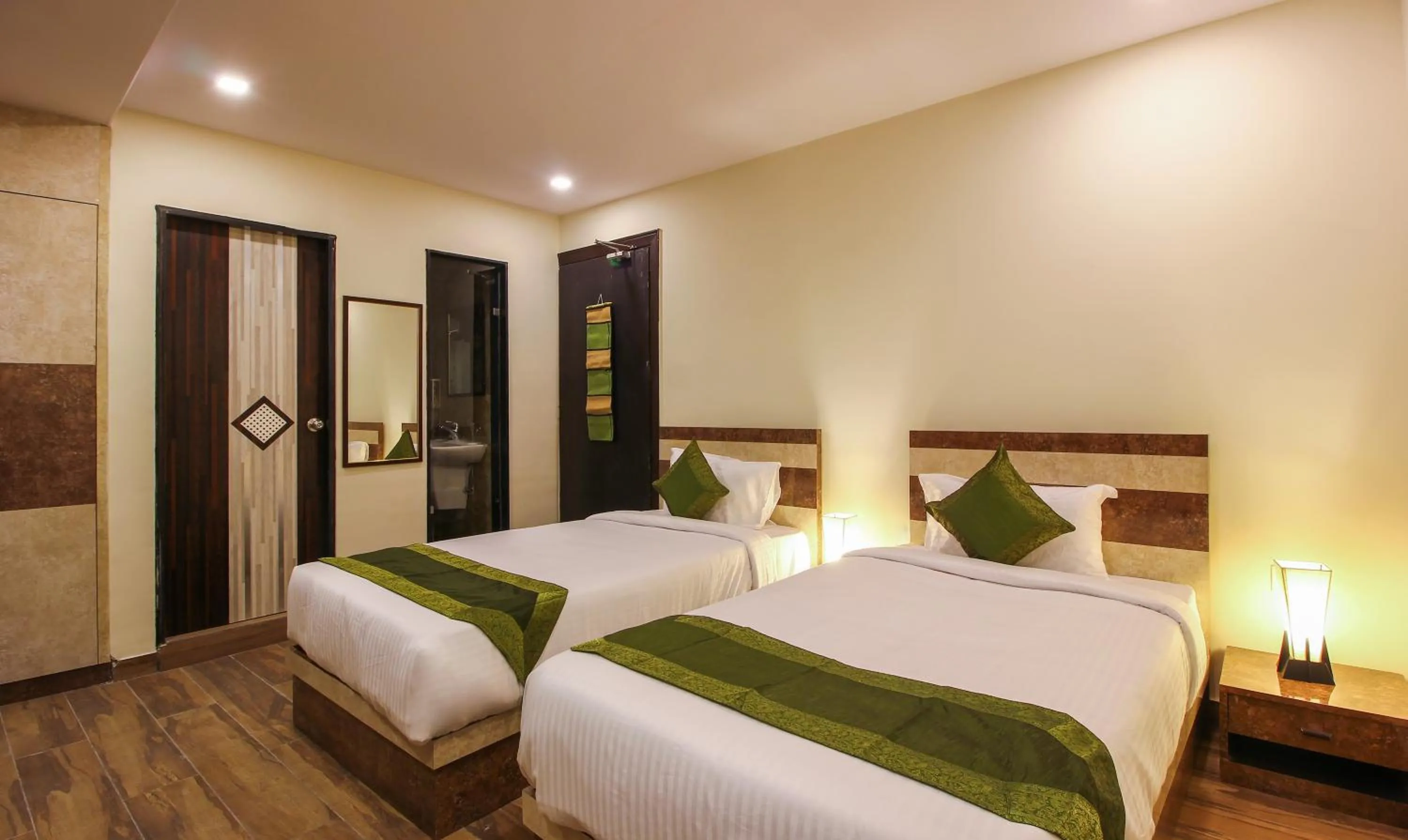 Bedroom, Bed in Treebo Address Inn, Banjara Hills