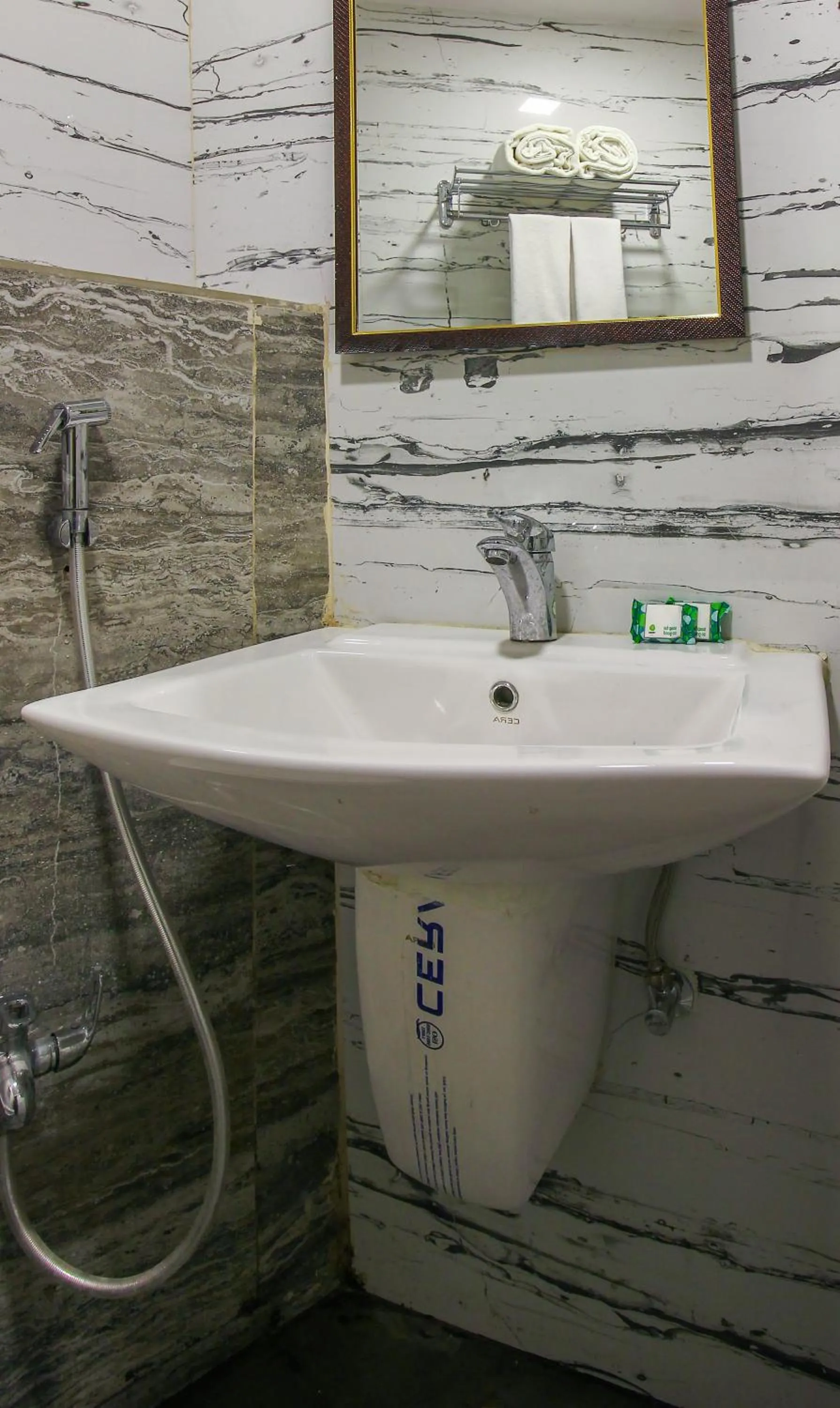 Toilet in Treebo Address Inn, Banjara Hills