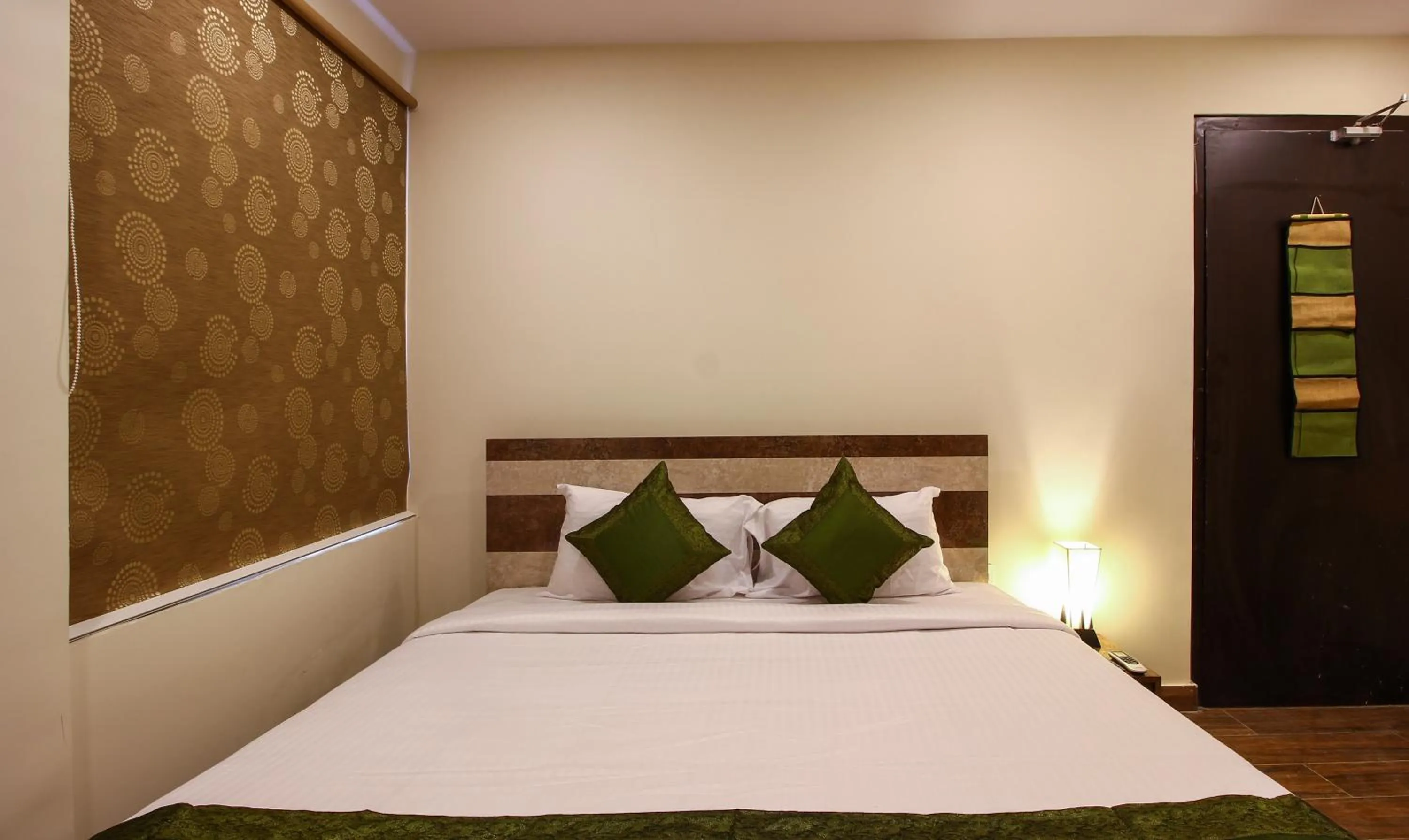 Bedroom, Bed in Treebo Address Inn, Banjara Hills