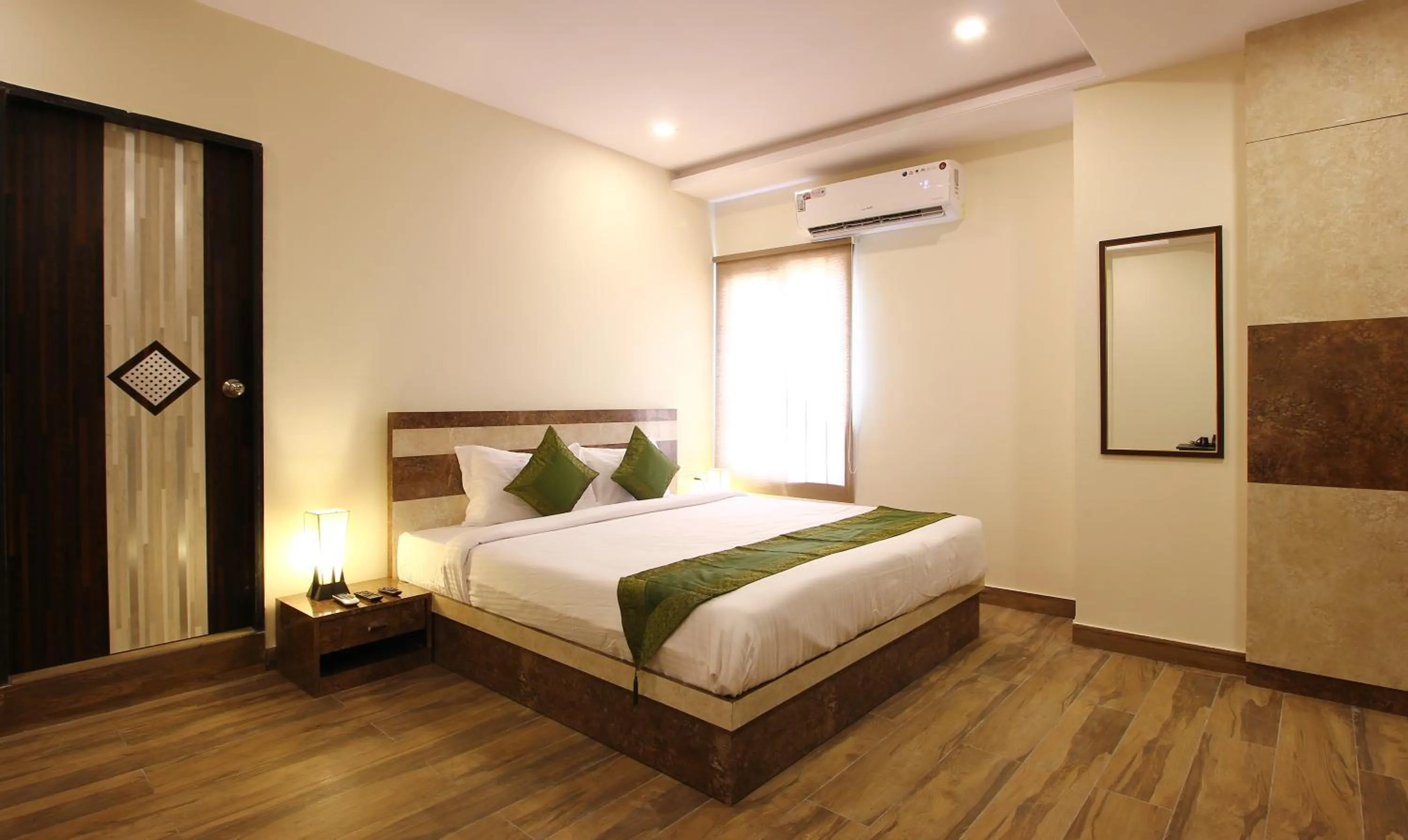 Bedroom, Bed in Treebo Address Inn, Banjara Hills