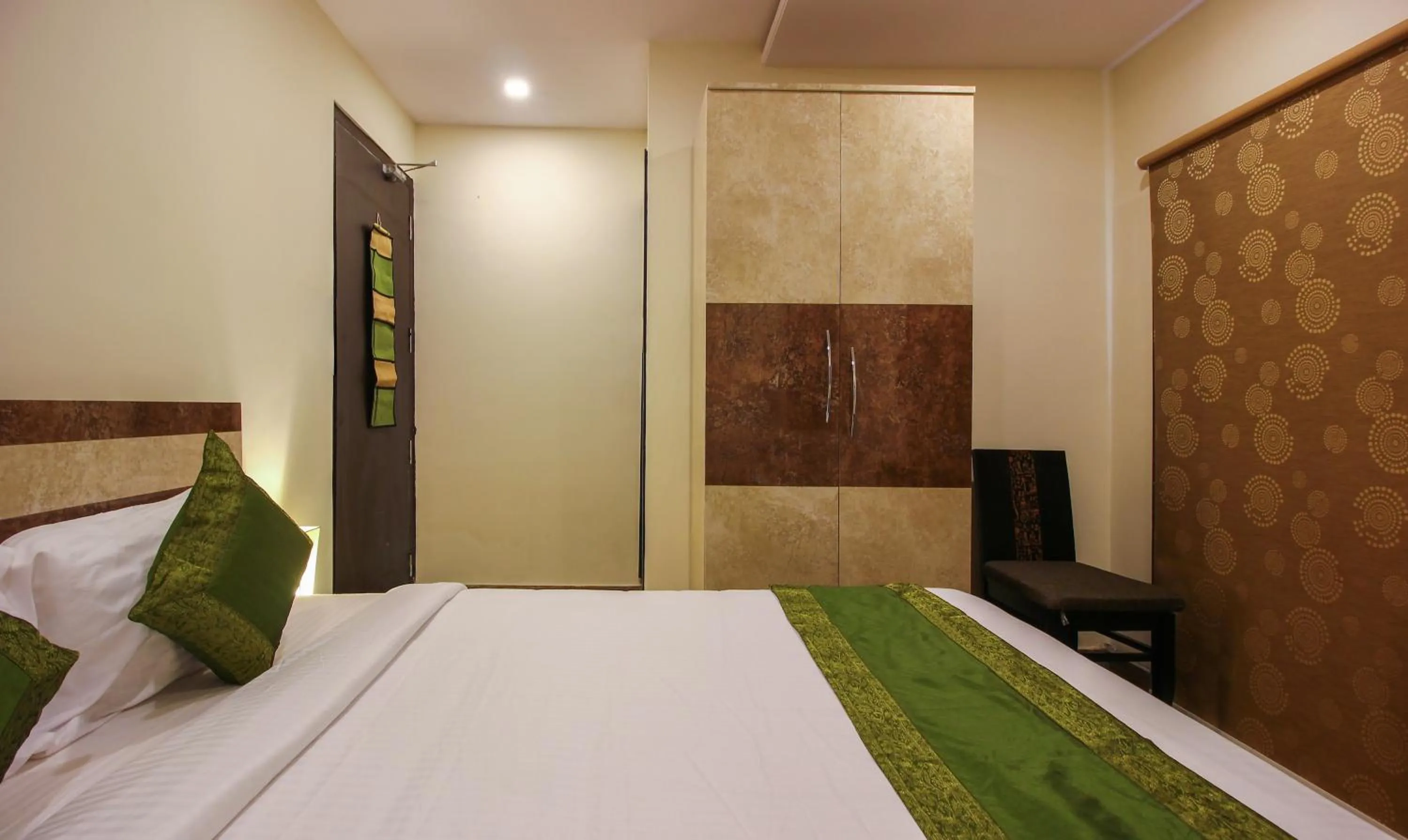 Bedroom, Bed in Treebo Address Inn, Banjara Hills
