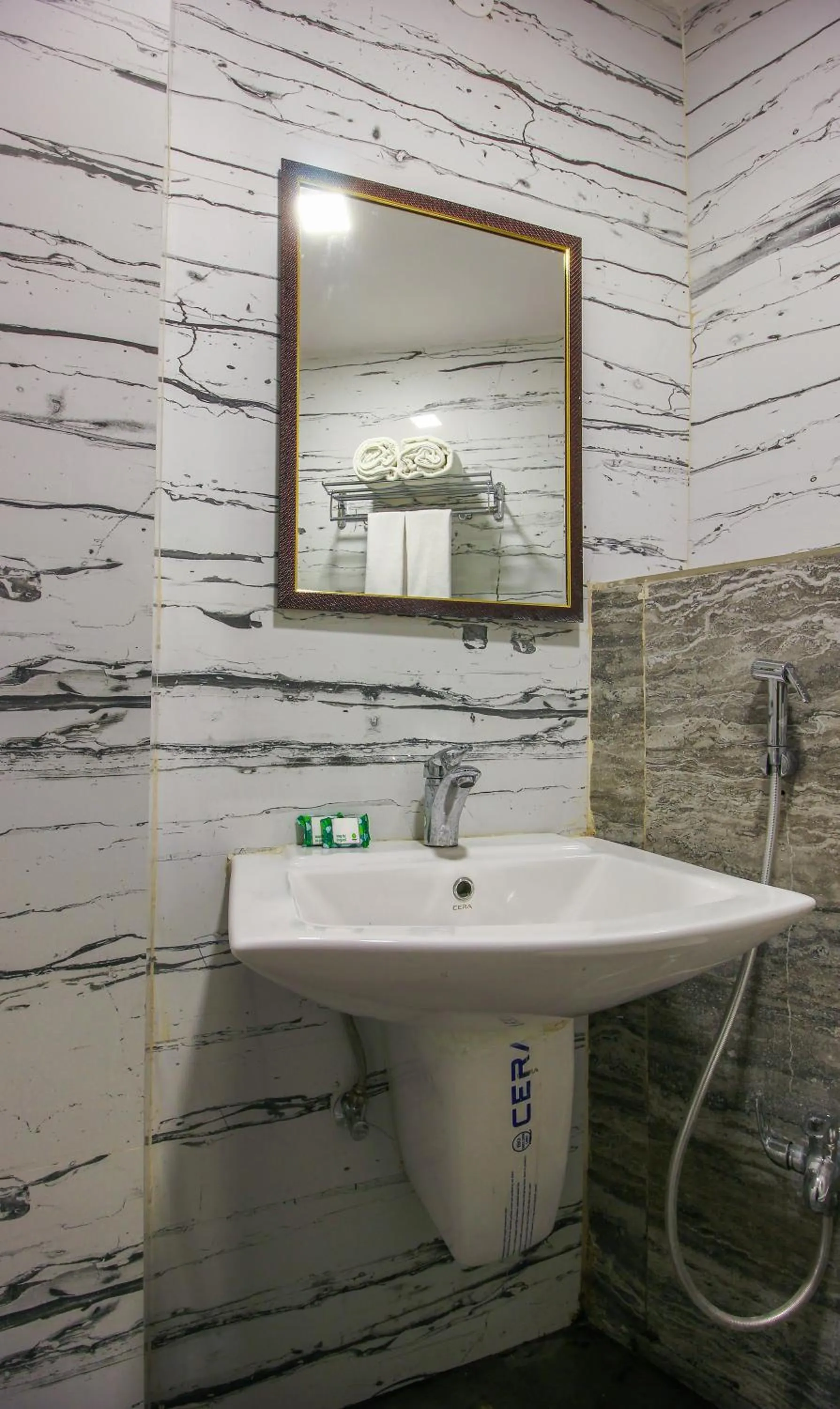 Bathroom in Treebo Address Inn, Banjara Hills