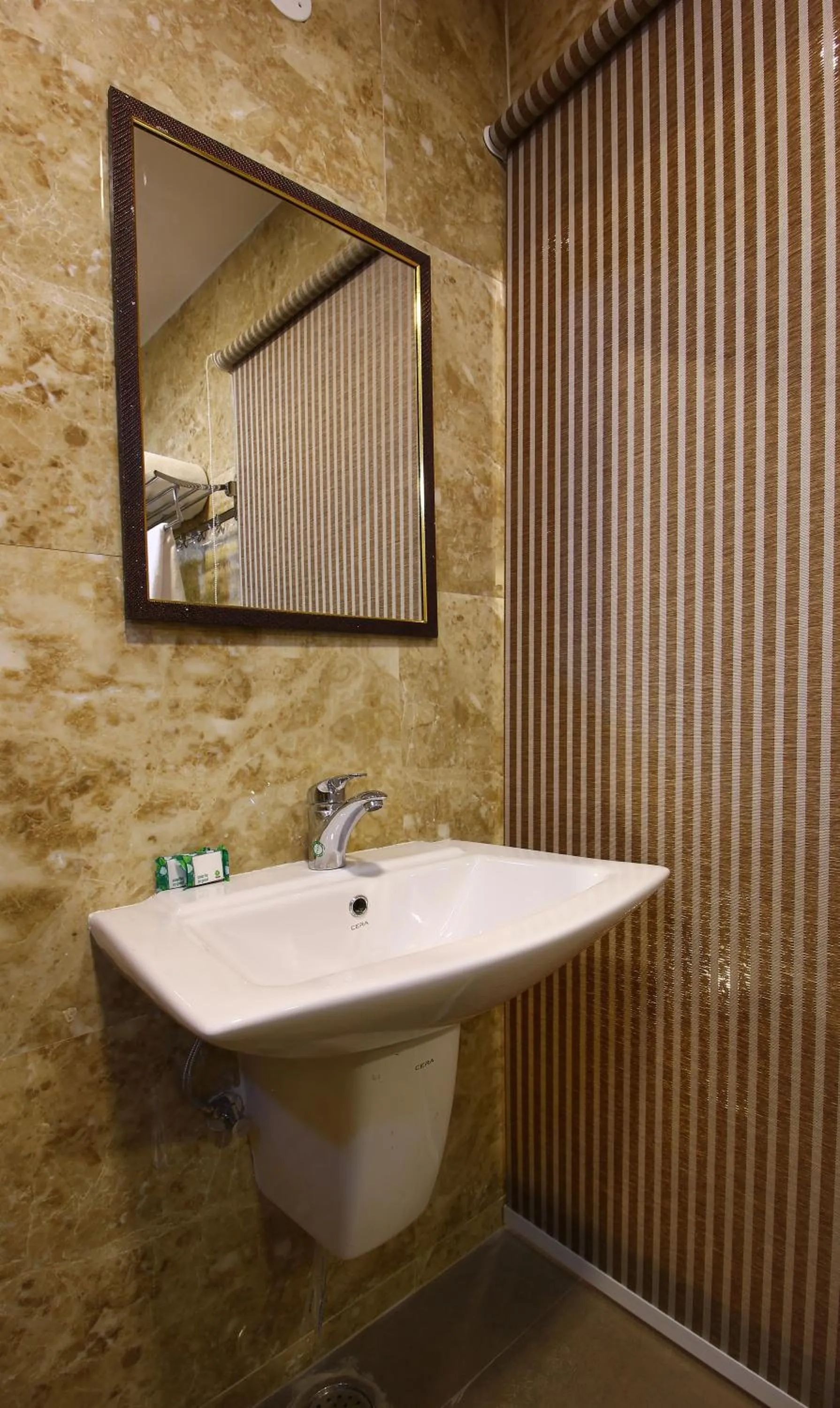 Bathroom in Treebo Address Inn, Banjara Hills