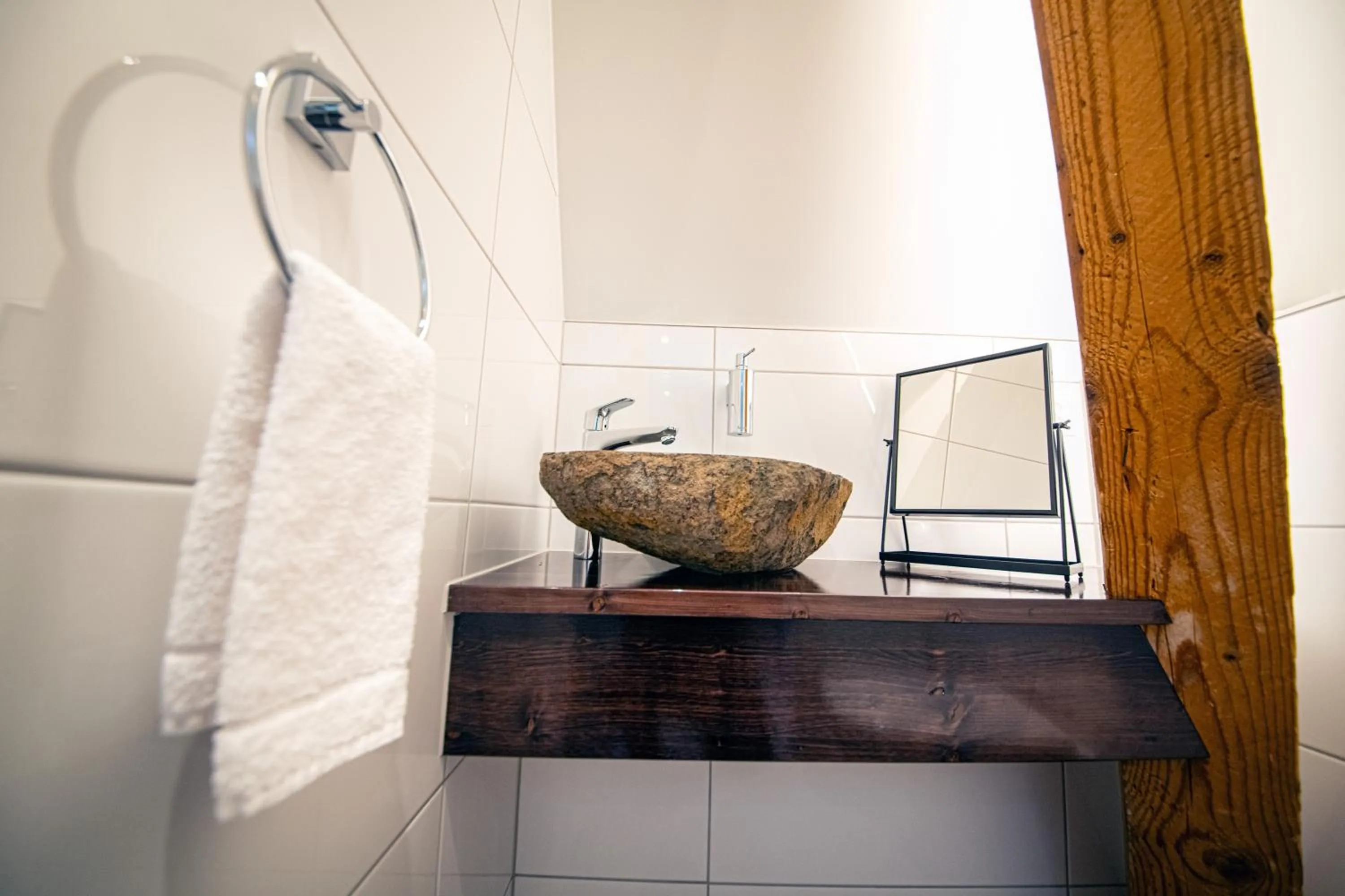 Toilet in Swiss Inn & Apartments