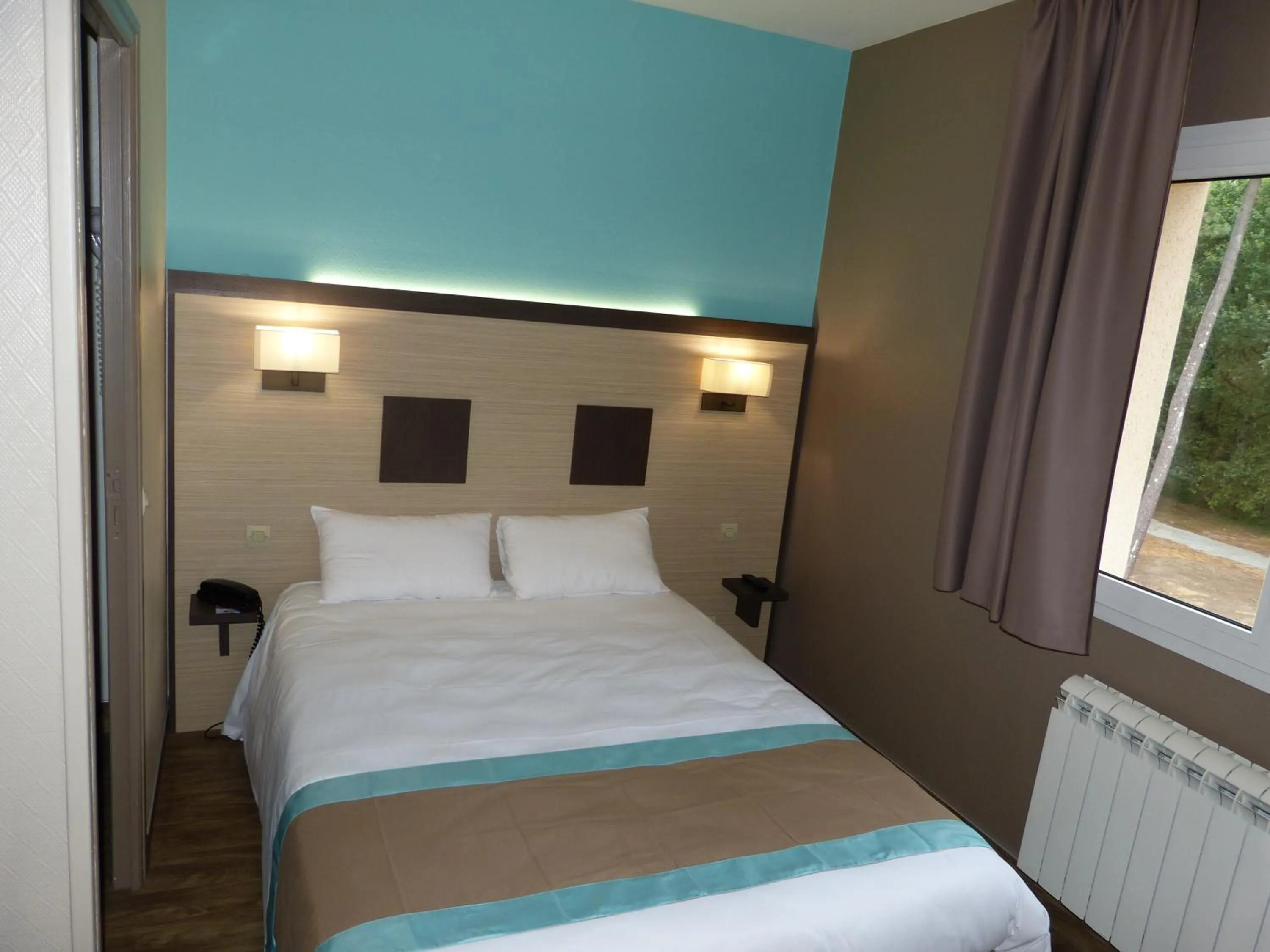 Bedroom, Bed in Hotel ARBOR - Les Hunaudieres - Le Mans Sud - Mulsanne